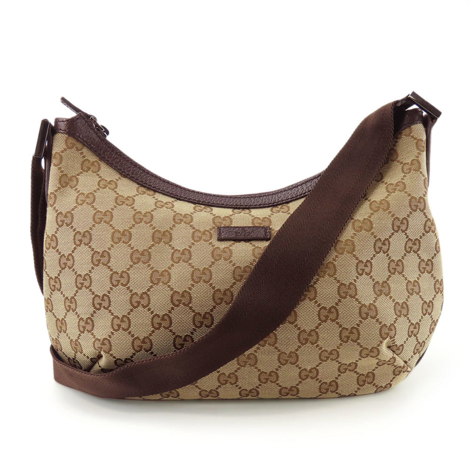 Shoulder Bag Gg Canvas: Shoulder Bag Gg Canvas The Gucci Line GG Canvas Shoulder Bag features a sturdy beige brown GG canvas material, a zippered outer pocket, and a substantial weight of 181.09kg. This shoulder bag is desig