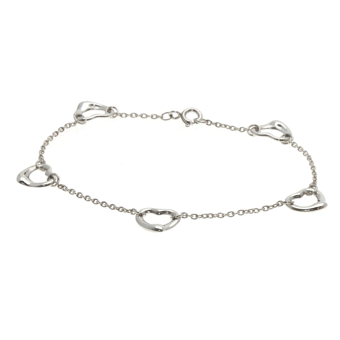 Open Heart Bracelet Silver by Tiffany&Co: Open Heart Bracelet Silver by Tiffany&Co Silver Open Heart Bracelet by Tiffany&Co, a sleek and modern design featuring a silver metal exterior, this bracelet is a simple yet elegant accessory. With no