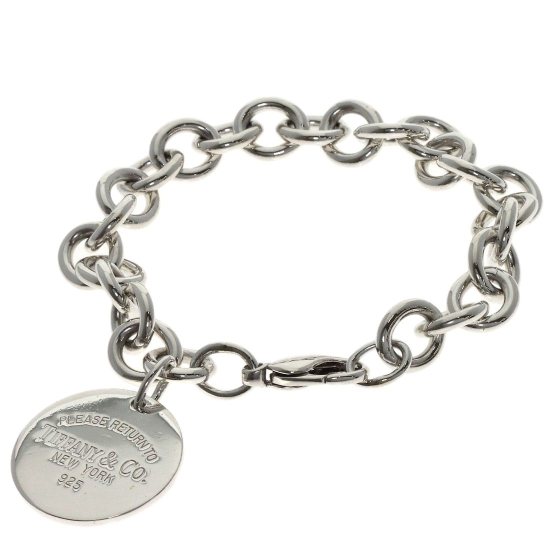 Return To Tiffany Round Silver Tag Bracelet: Return To Tiffany Round Silver Tag Bracelet Silver Round Tag Bracelet from Tiffany&Co. Features a sleek, round design with a silver finish, making it a timeless and elegant accessory. This classic bra