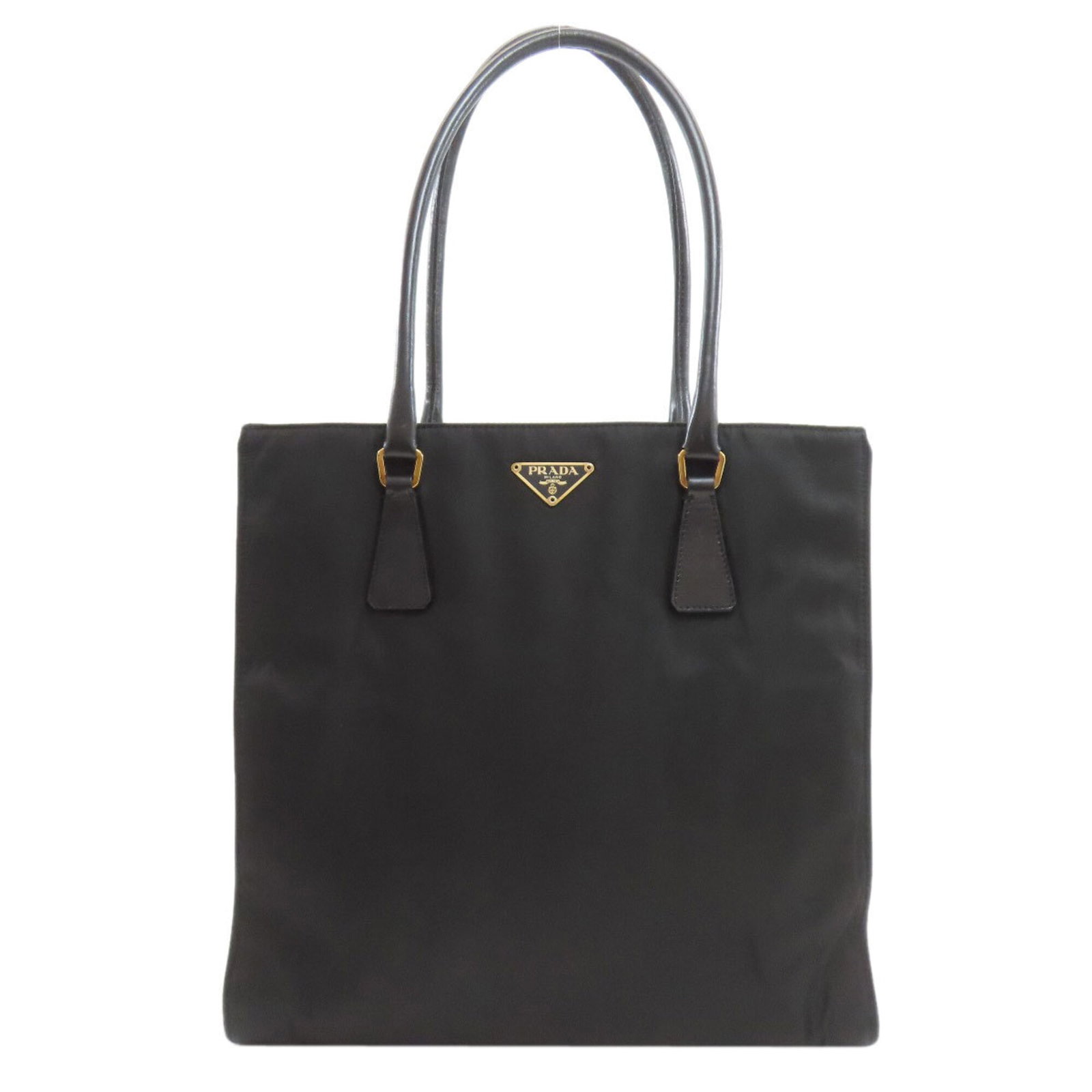 Tote Bag Nylon Prada: Tote Bag Nylon Prada Black nylon tote bag from Prada, featuring a zipper pocket for added convenience, and a sturdy handle for easy carrying. Measuring 31cm x 30cm x 8cm, this compact tote is perfect