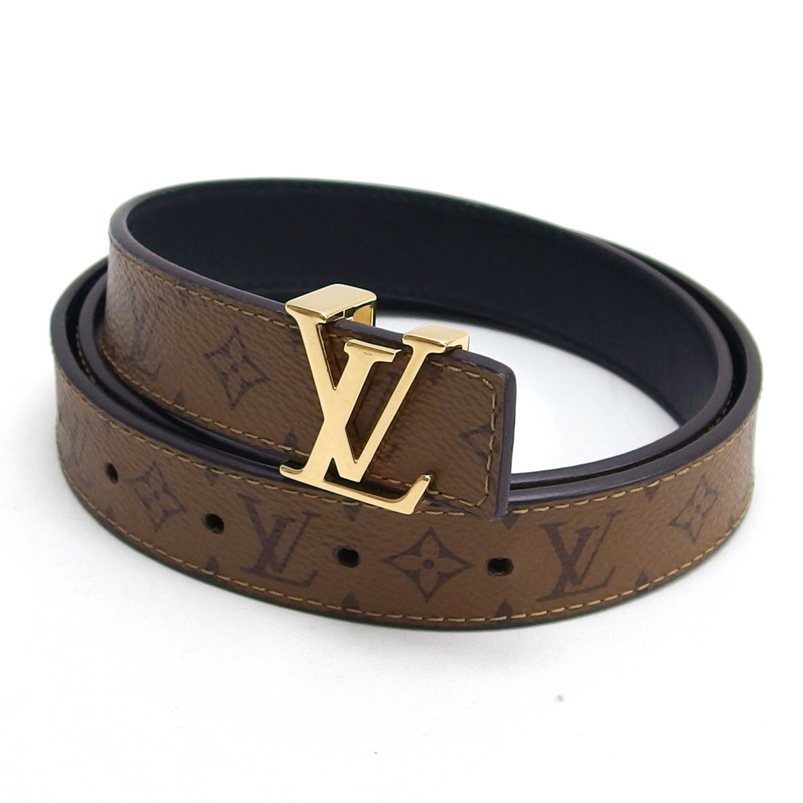 Standard belt by Louis Vuitton: Standard belt by Louis Vuitton Standard belt by Louis Vuitton, available in black, brown, and dark brown colors, features a monogram canvas or leather strap with a length range of 29.33'' to 33.26''. 