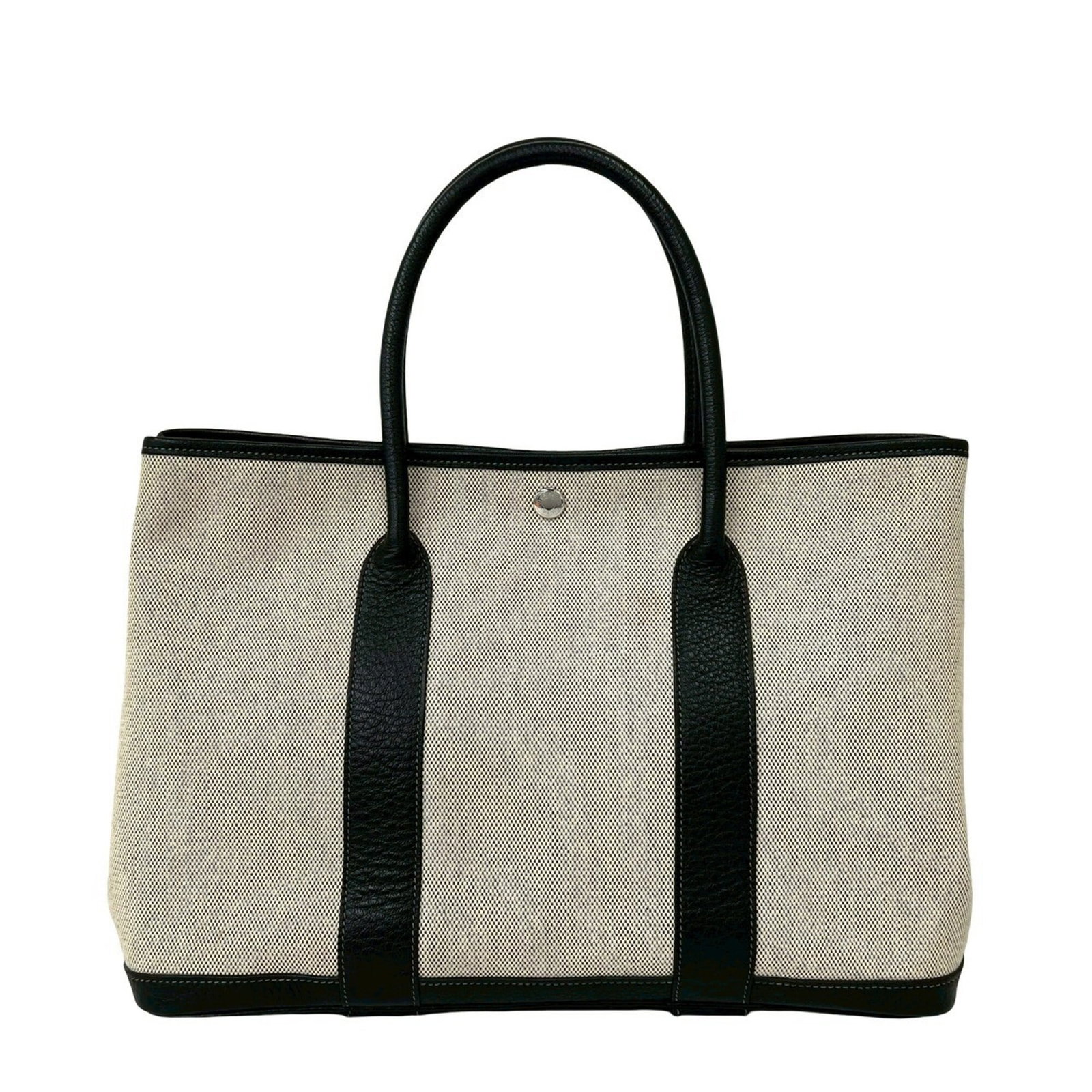 Hermes Leather Tote Bag Toile: Hermes Leather Tote Bag Toile Toile de Jouy, a classic Herm?s design, adorns this black leather tote bag in a timeless and elegant black and gray color scheme. The bag's dimensions and material, made