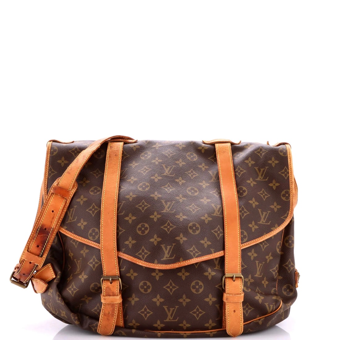Handbag Canvas Monogram 43 Louis Vuitton Saumur: Handbag Canvas Monogram 43 Louis Vuitton Saumur The Louis Vuitton Saumur Handbag Monogram Canvas 43 features a classic messenger design with a timeless brown canvas exterior and gold hardware.
