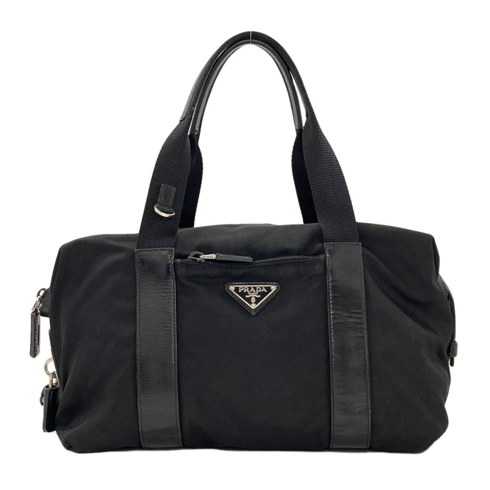 Tote Bag Nylon Prada: Tote Bag Nylon Prada Nylon Prada tote bag in black, measuring 16cm x 31cm x 13cm. This tote bag features a durable nylon material and a sleek, compact design. Its signature is present, bearing the