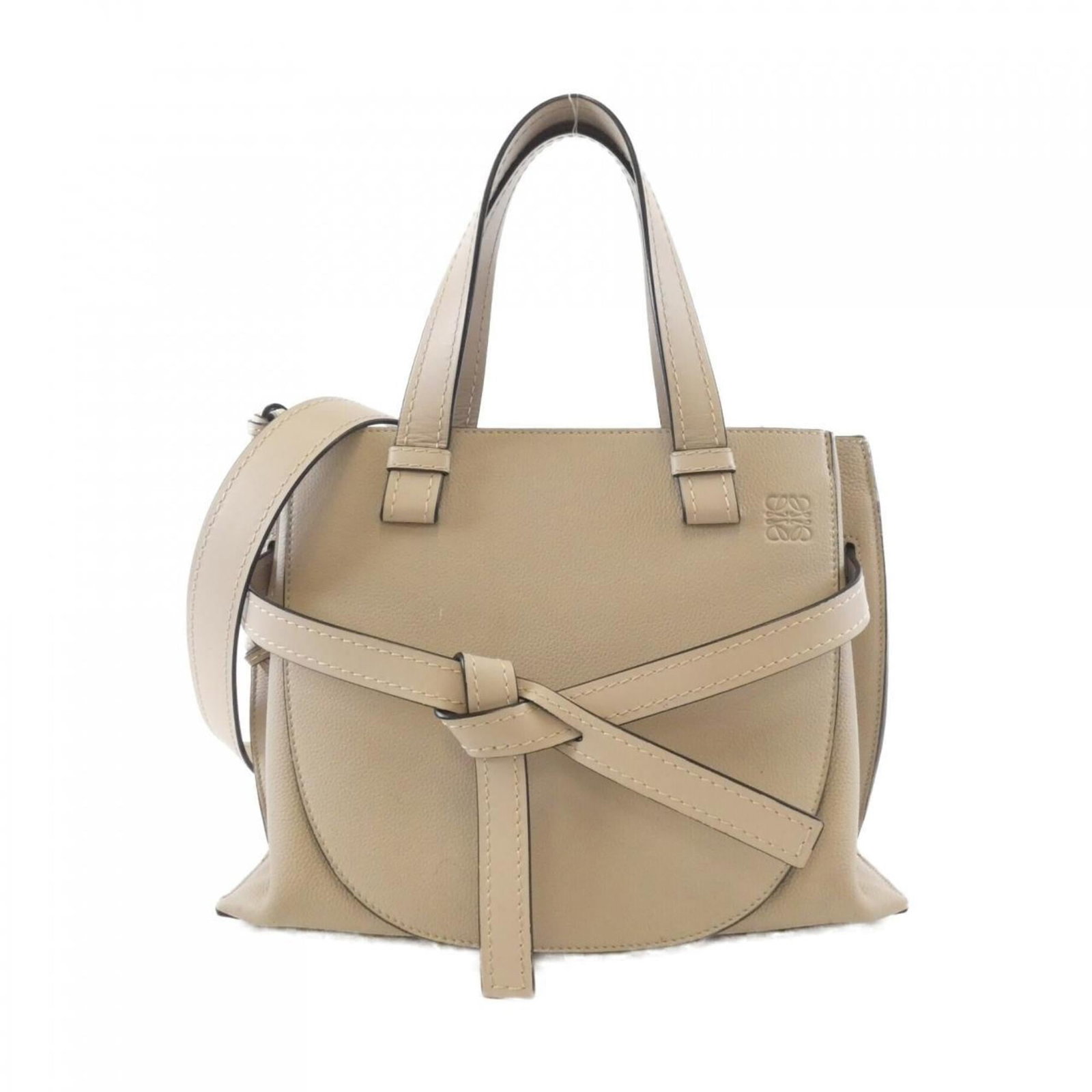 Handbag Leather Handbag: Handbag Leather Handbag The Loewe MPN 321 12 Z99 Handbag is a stylish and elegant piece made from high-quality calfskin leather. This light beige handbag features a classic design and comes with a
