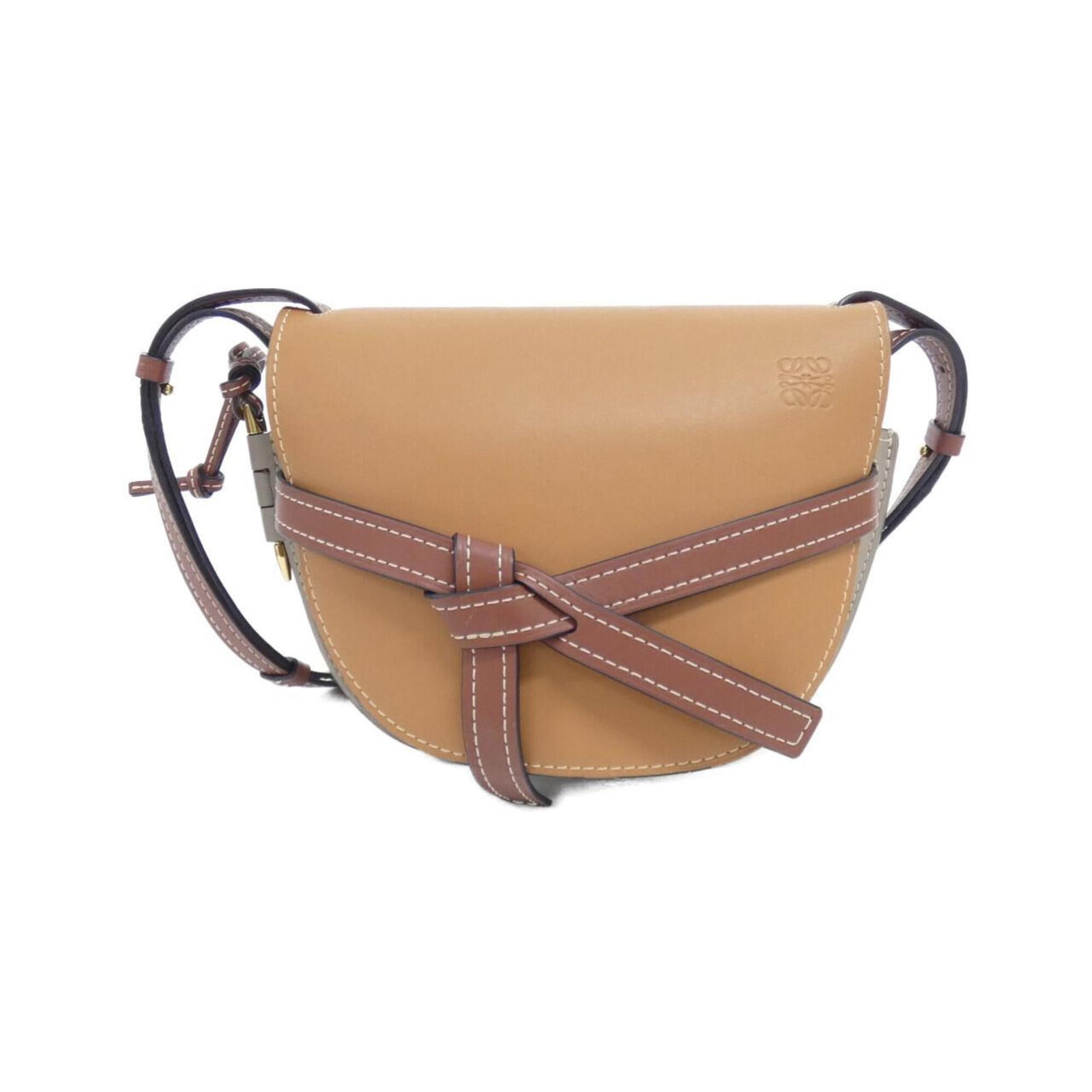 Shoulder Bag Leather: Shoulder Bag Leather The Loewe MPN 321 54 T20 Shoulder Bag is crafted from high-quality leather, specifically calfskin, in a timeless gray color. Measuring 19cm x 20cm x 10cm, this stylish bag is