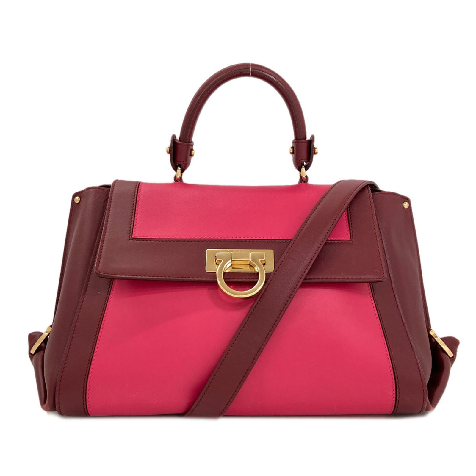 Salvatore Ferragamo Handbag Leather: Salvatore Ferragamo Handbag Leather Salvatore Ferragamo Handbag Leather is a stunning Bordeaux and Pink leather handbag, featuring a classic design with a 24cm handle and adjustable strap length.