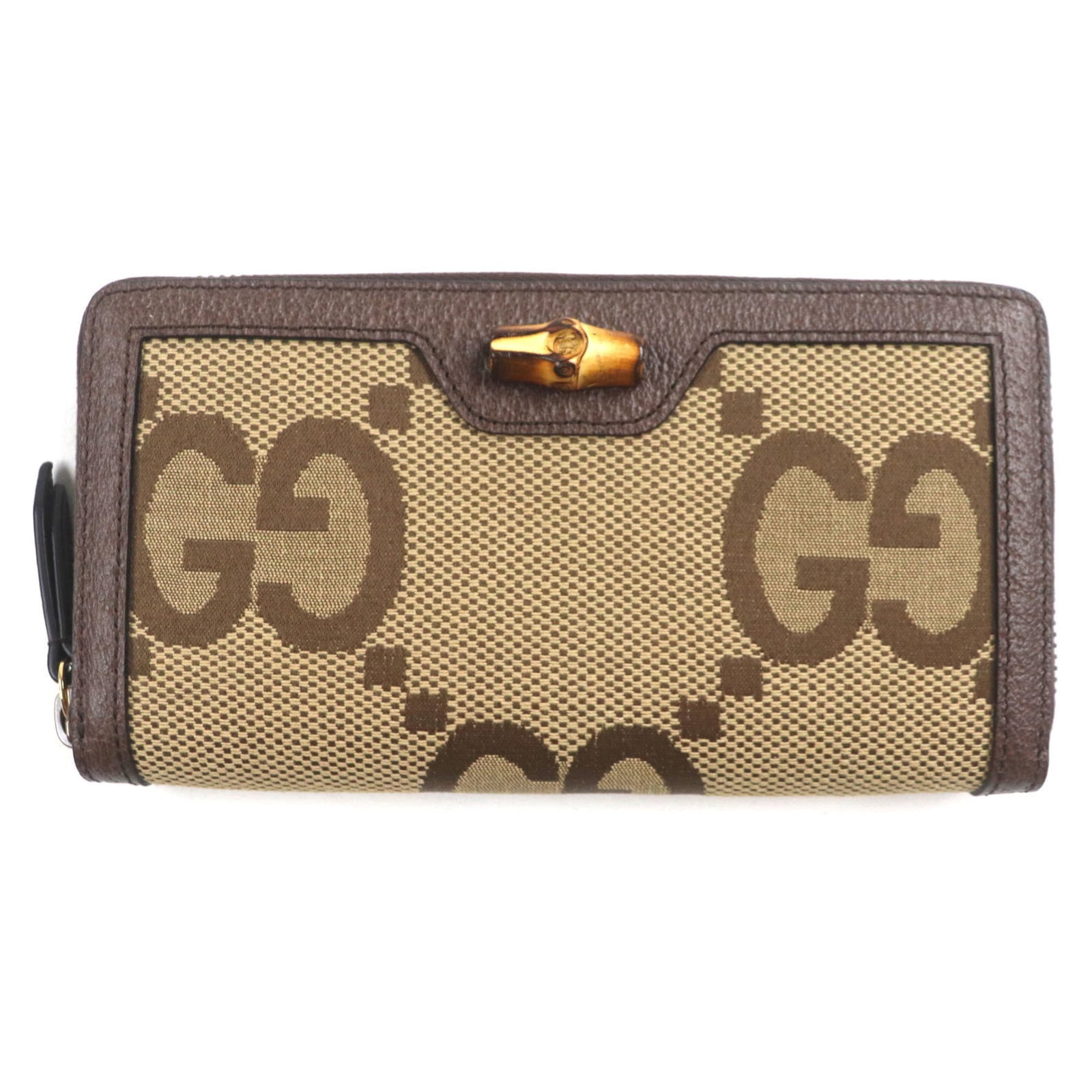 Bamboo Gg Canvas Bi fold Long Wallet Gucci: Bamboo Gg Canvas Bi fold Long Wallet Gucci Bamboo Gg Canvas Bi fold Long Wallet Gucci features a unique blend of sustainable bamboo and iconic GG canvas, presented in a stylish beige and brown color