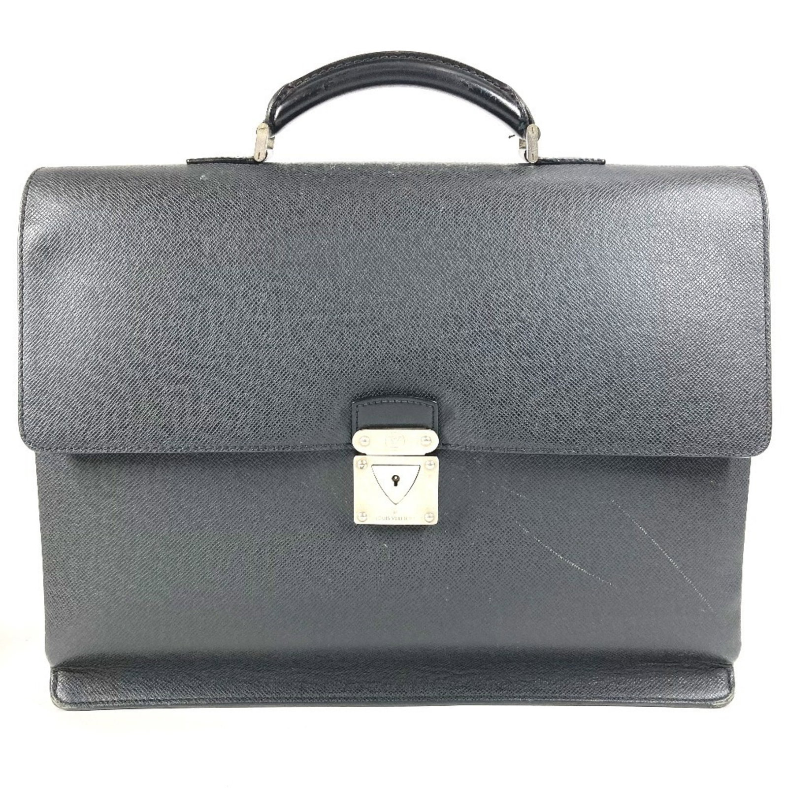Handbag Taiga Briefcase Louis Vuitton Leather: Handbag Taiga Briefcase Louis Vuitton Leather Taiga leather briefcase in Ardoise color, featuring a classic design from Louis Vuitton. Made in France, this M30032 briefcase measures 30cm x 41cm x 7cm