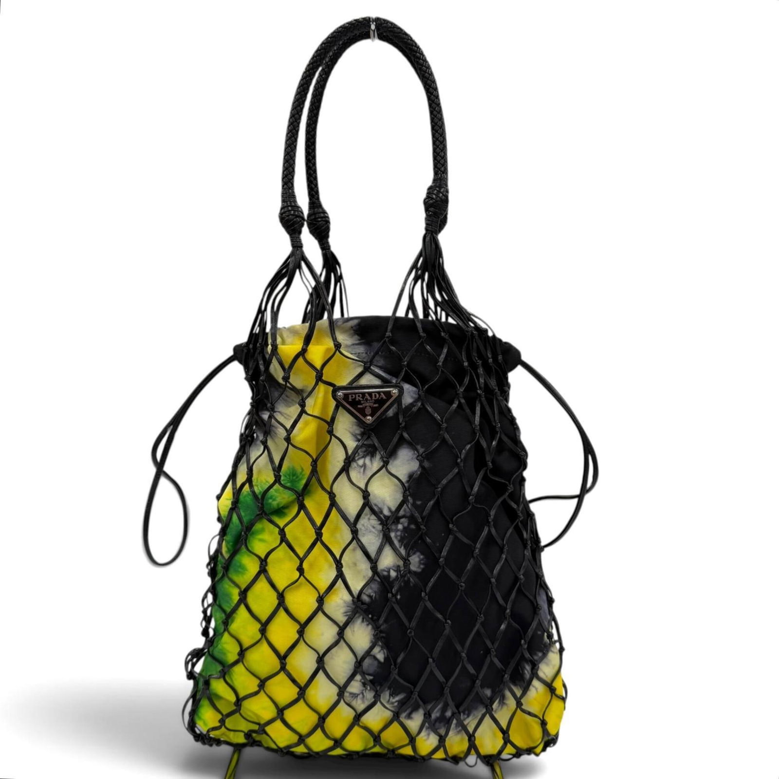Nylon Leather Tote Prada Handbag: Nylon Leather Tote Prada Handbag Nylon and leather combine in a sleek, black and yellow Prada Country tote bag, measuring 35cm x 28cm x 13.77'' x 11.02''. This Italian-made handbag features a durable