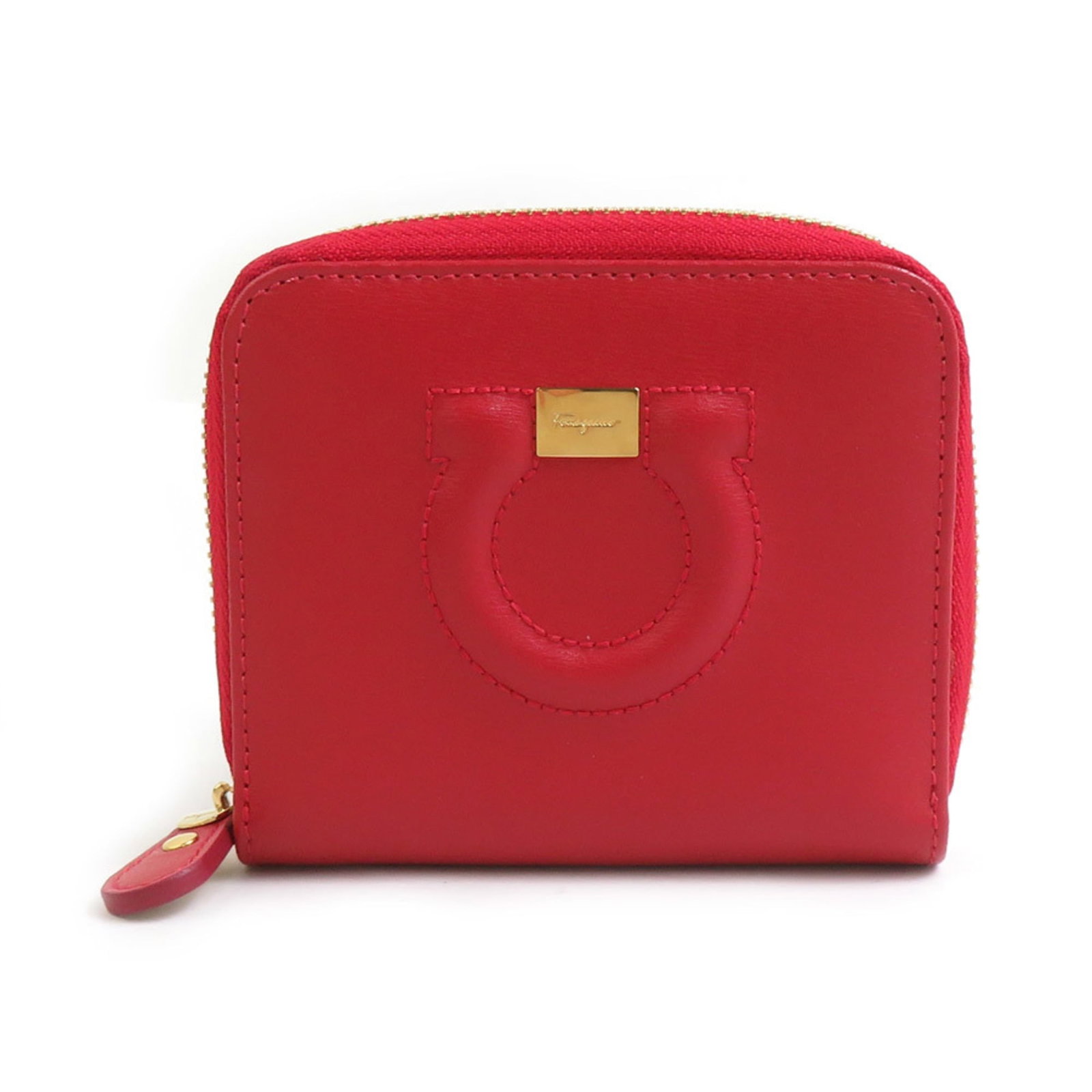 Salvatore Ferragamo Leather Wallet Bi-Fold: Salvatore Ferragamo Leather Wallet Bi-Fold Salvatore Ferragamo Leather Wallet Bi-Fold in Red, presented in a luxurious box, showcases the Italian brand's signature style. Made from high-quality
