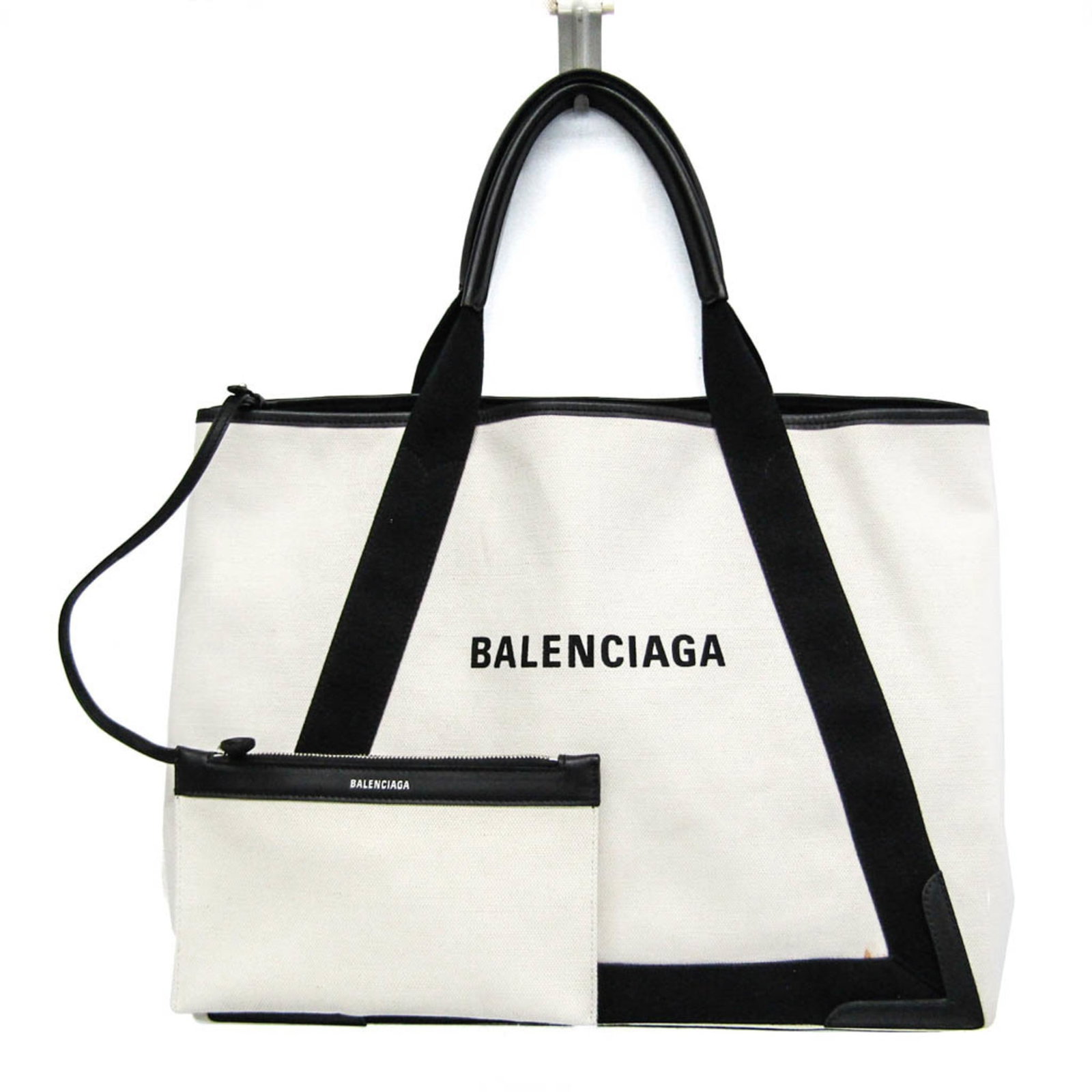 Canvas Leather Handbag Tote Balenciaga: Canvas Leather Handbag Tote Balenciaga Canvas Leather Balenciaga Navy Cabas Tote Bag. This navy cabas tote bag features a unique combination of canvas and leather materials, with a classic black and