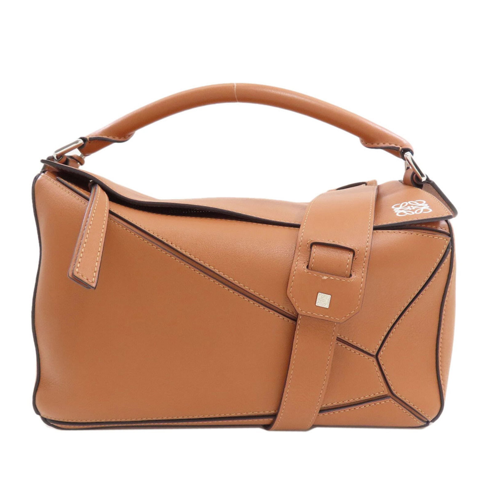 Handbag Leather Handbag: Handbag Leather Handbag Brown leather handbag with a classic design, measuring 18cm x 29cm x 12.5cm. This stylish bag features high-quality leather construction and a timeless shape that suits a varie