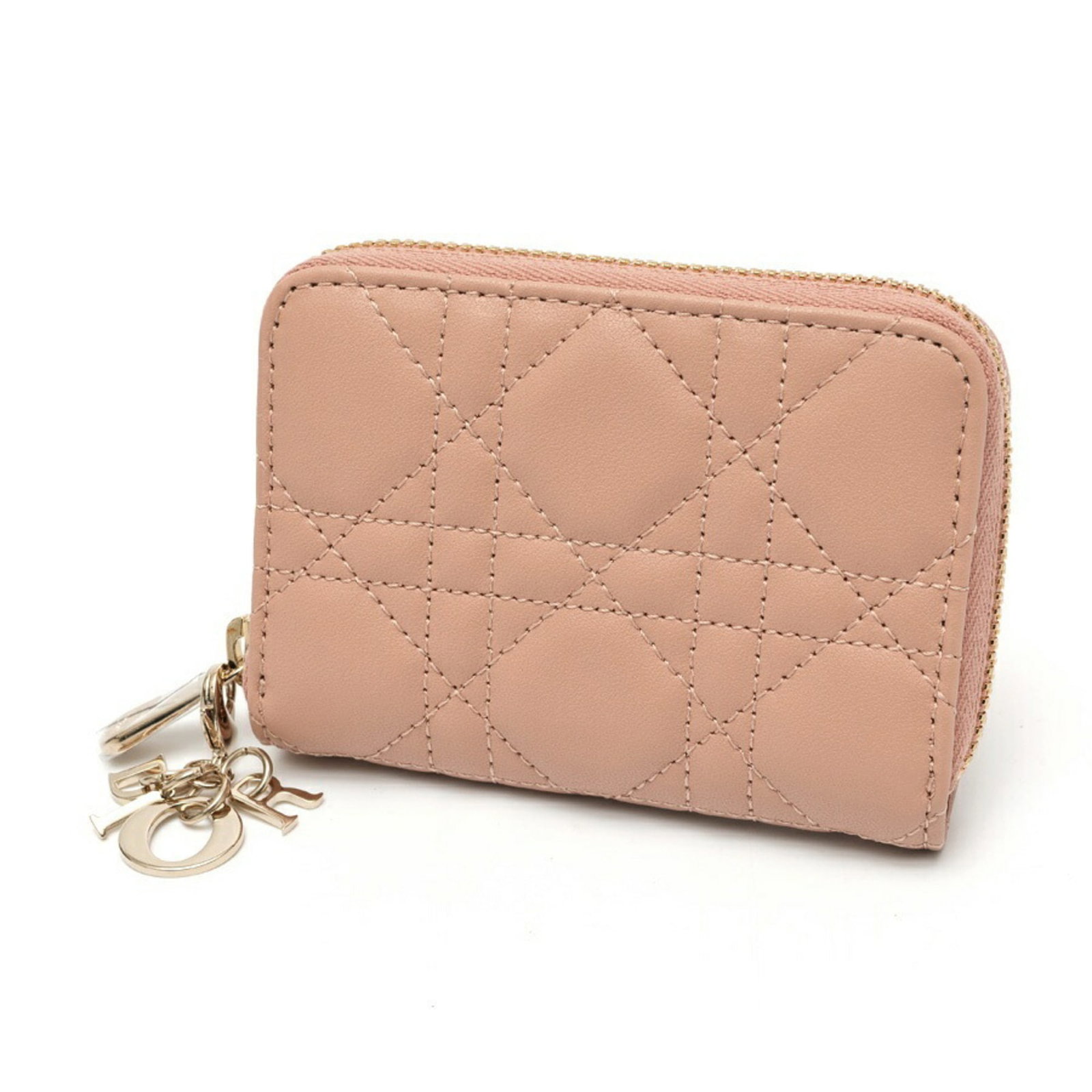 Dior Christian Coin Leather Purse: Dior Christian Coin Leather Purse The Dior Christian Coin Leather Purse is a sleek and sophisticated accessory, boasting a classic coin purse design. Made from high-quality Italian leather, this small