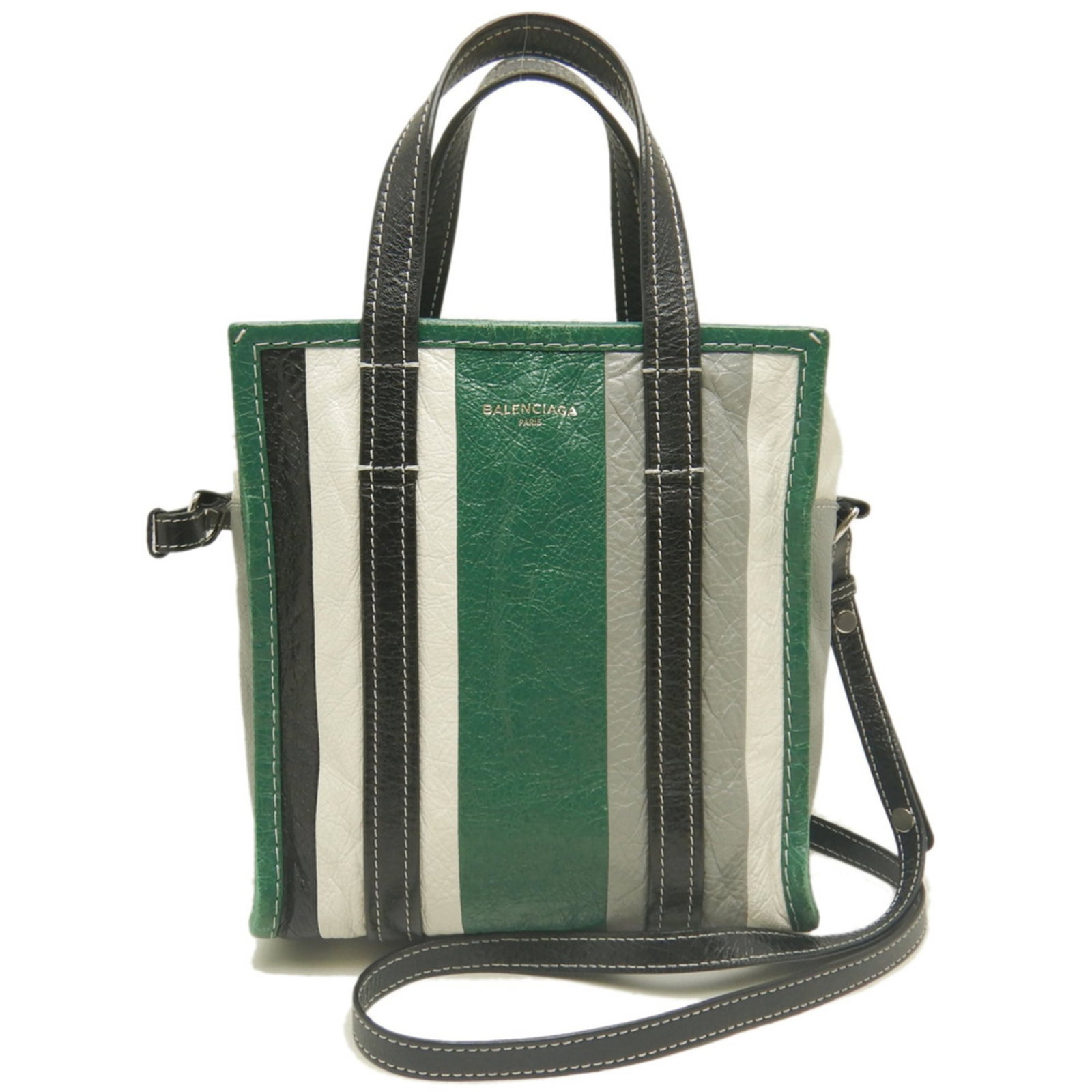 Bag Leather Tote Balenciaga: Bag Leather Tote Balenciaga Bag Leather Tote Balenciaga is a luxurious black tote bag made from lambskin leather, featuring a sleek silver zipper closure and adjustable straps. Its compact size and