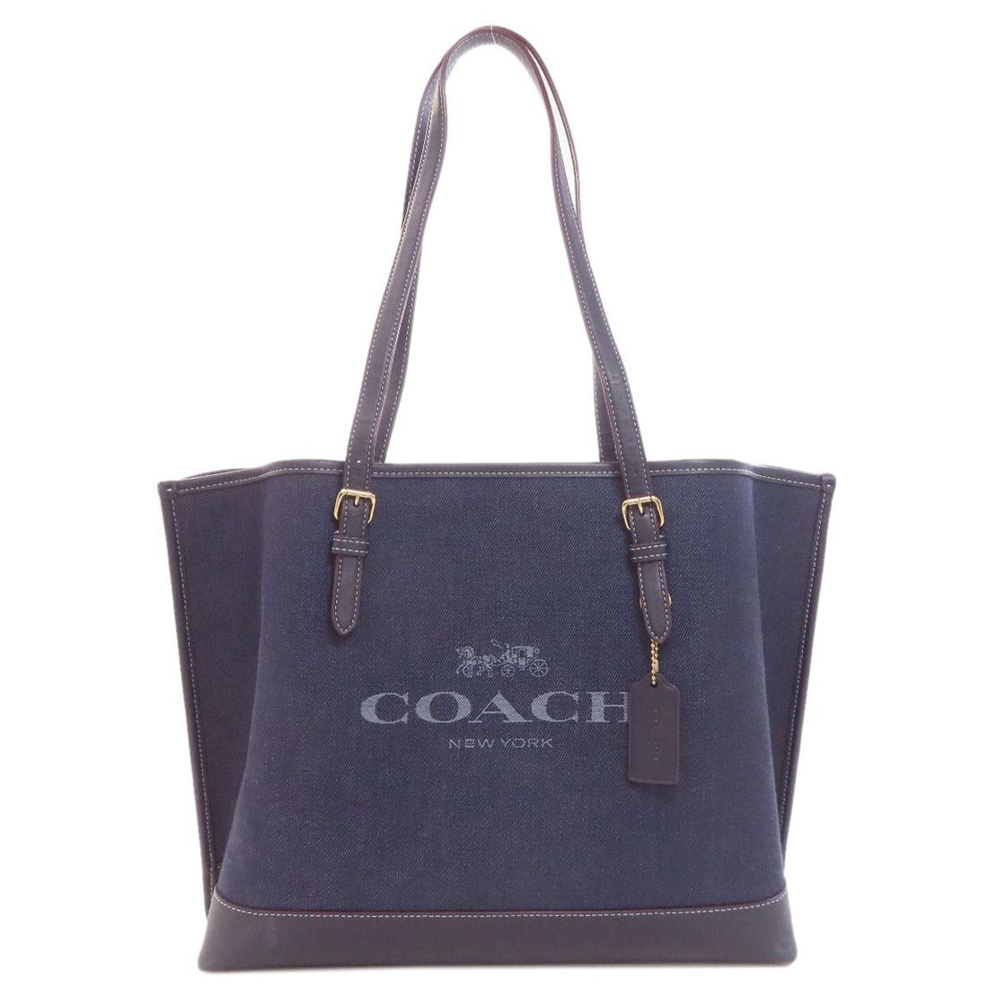 Molly Tote Bag Coach Denim: Molly Tote Bag Coach Denim Blue COACH Denim Tote Bag with classic style and a denim exterior, featuring an open closure and a sturdy design. Measuring 11.0 inches in height and 5.1 inches in depth, th