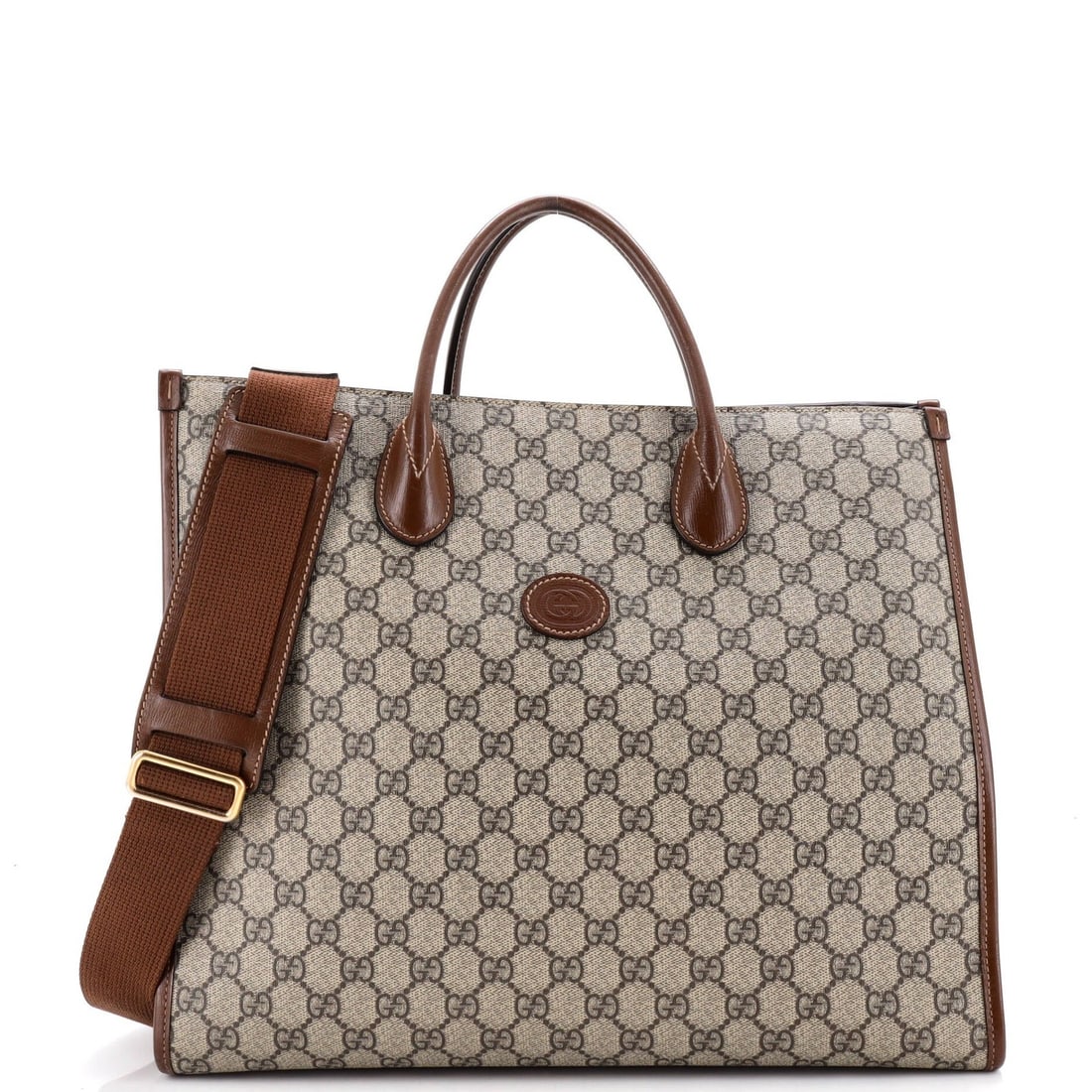 Structured Top Handle Tote Medium Coated GG Canvas Gucci: Structured Top Handle Tote Medium Coated GG Canvas Gucci Structured Top Handle Tote in Medium Brown GG Coated Canvas from Gucci. This medium-sized tote boasts a structured top handle and open tote des