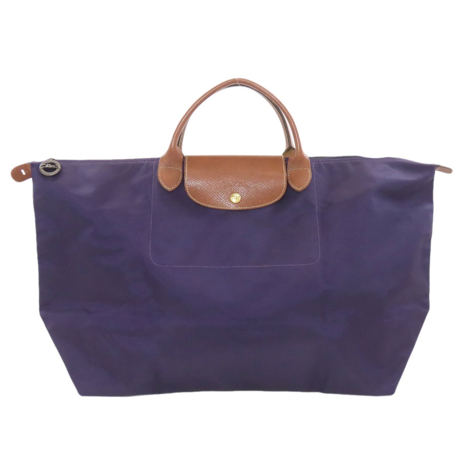 Nylon Longchamp Handbag: Nylon Longchamp Handbag Purple Nylon Longchamp Handbag, 34cm x 63cm x 22cm, features a vibrant purple color and durable nylon material, making it a stylish and practical accessory. The bag's