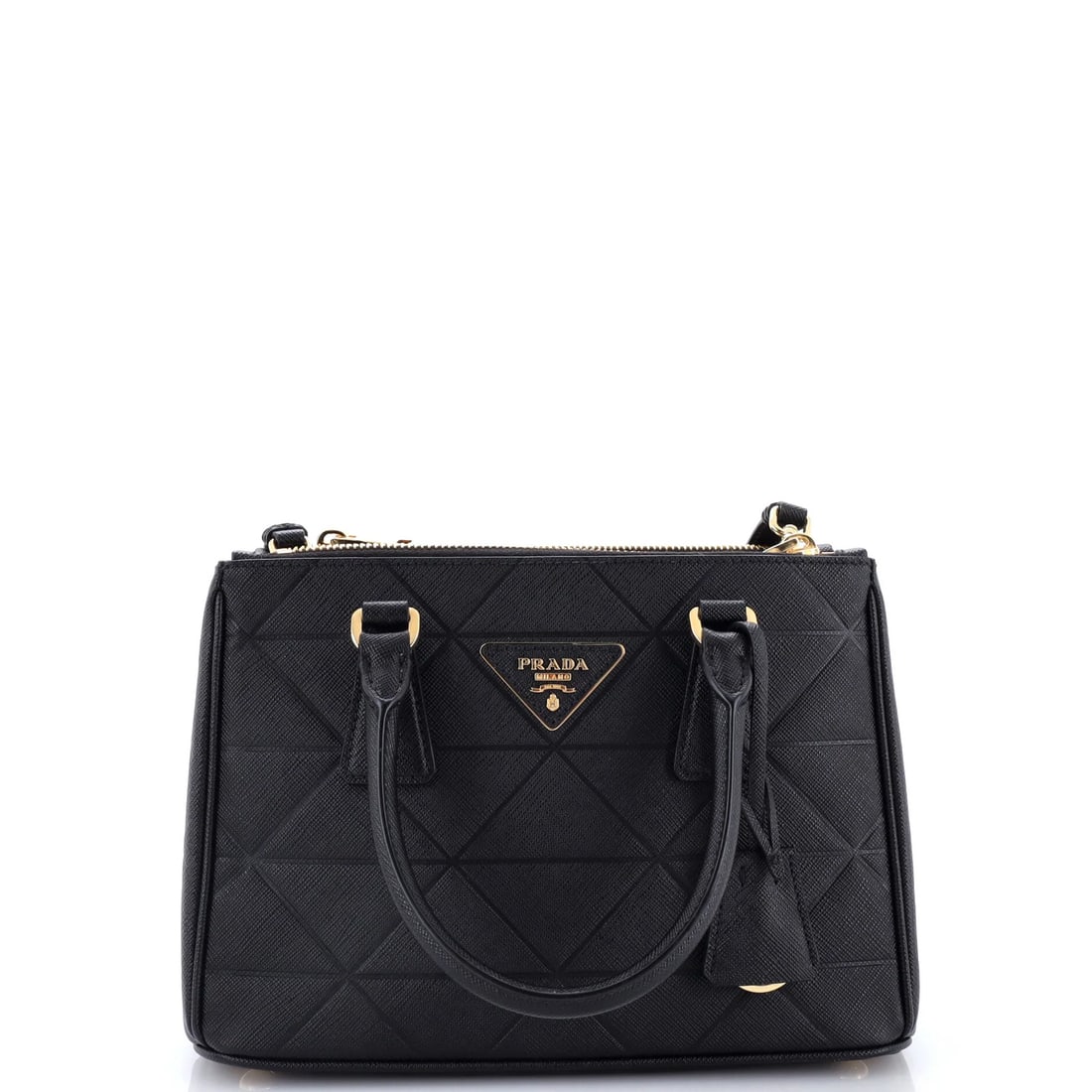Symbole Prada Double Tote Saffiano Leather Mini Zip: Symbole Prada Double Tote Saffiano Leather Mini Zip Black Saffiano Leather Mini Zip Cross Body Bag with Double Zip Closure, featuring a sleek and sophisticated design. The bag measures 6.5" tall, 9.5"