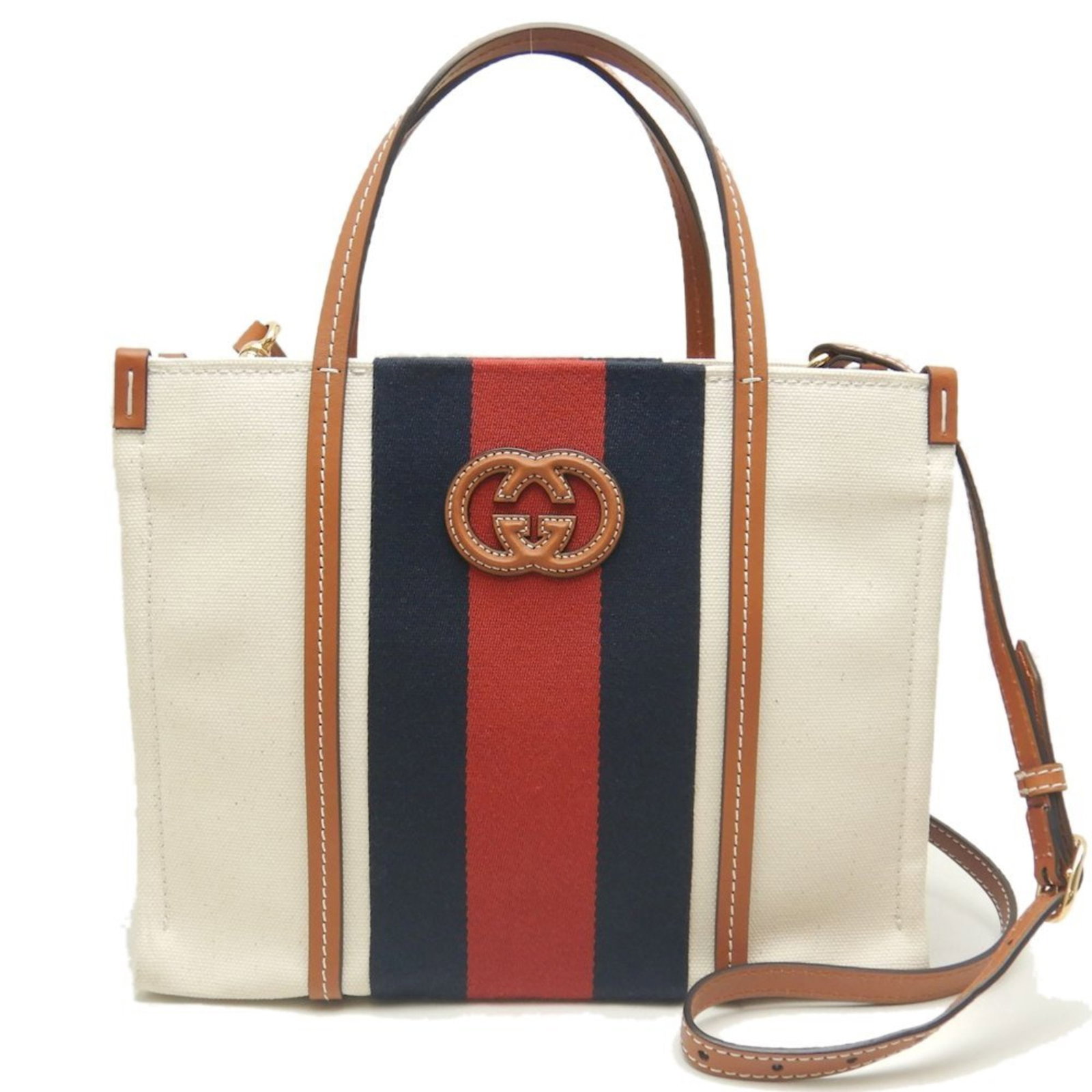 Canvas Gucci Tote Bag: Canvas Gucci Tote Bag Canvas Gucci Tote Bag, 24cm x 30cm x 13.5cm, made from high-quality canvas material, features a classic brown and ivory color combination, gold hardware, and an open closure.