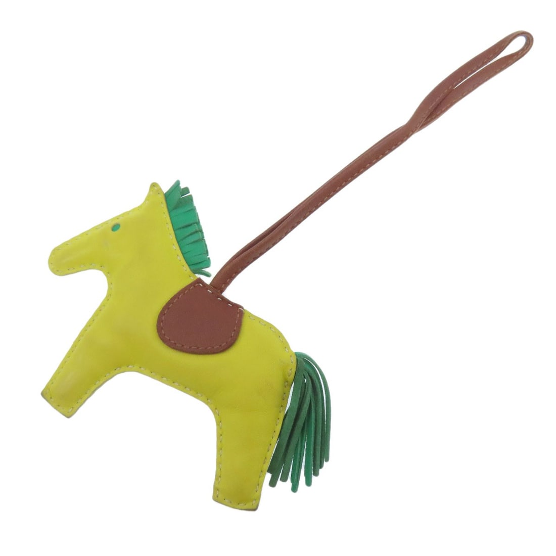 Mm Key Ring Rodeo Charm Hermes Anyo Miro: Mm Key Ring Rodeo Charm Hermes Anyo Miro Yellow Anyo Miro Mm Key Ring Rodeo Charm from Hermes. This vibrant yellow key ring features a rodeo charm, showcasing the brand's signature style. The Anyo