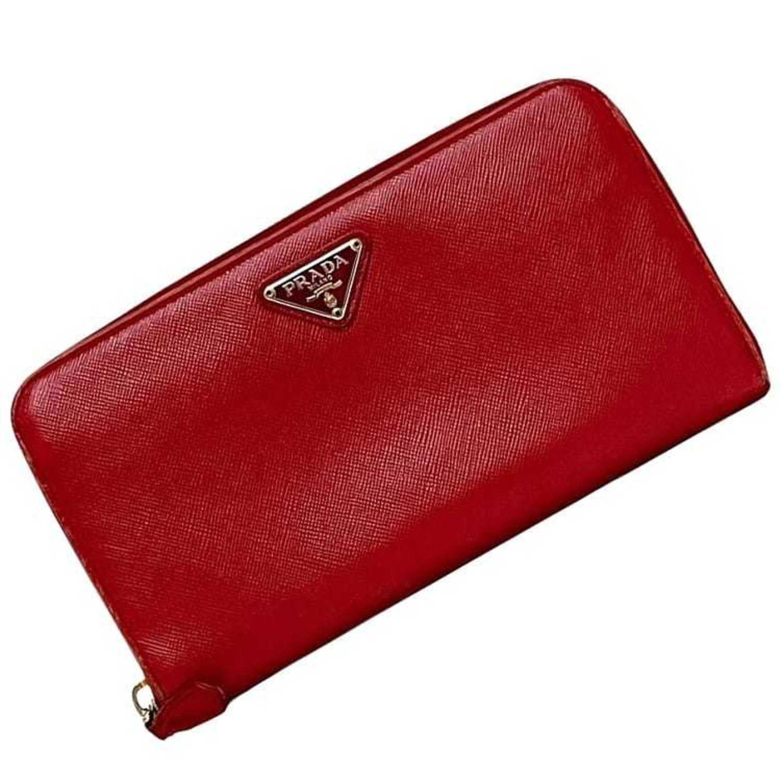 Prada Long Wallet (Bi-Fold) Saffiano: Prada Long Wallet (Bi-Fold) Saffiano Saffiano leather provides a durable and stylish foundation for this Prada bi-fold wallet, with a sleek red color that adds a pop of sophistication. Measuring 10.5c