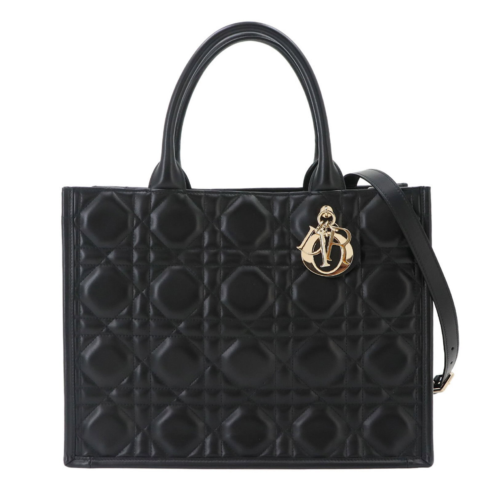 Handbag Leather Christian Dior Tote Bag: Handbag Leather Christian Dior Tote Bag Black leather Christian Dior tote bag with gold hardware, featuring a 41cm handle and adjustable strap length. This stylish tote measures 27cm x 36cm x 16.5cm