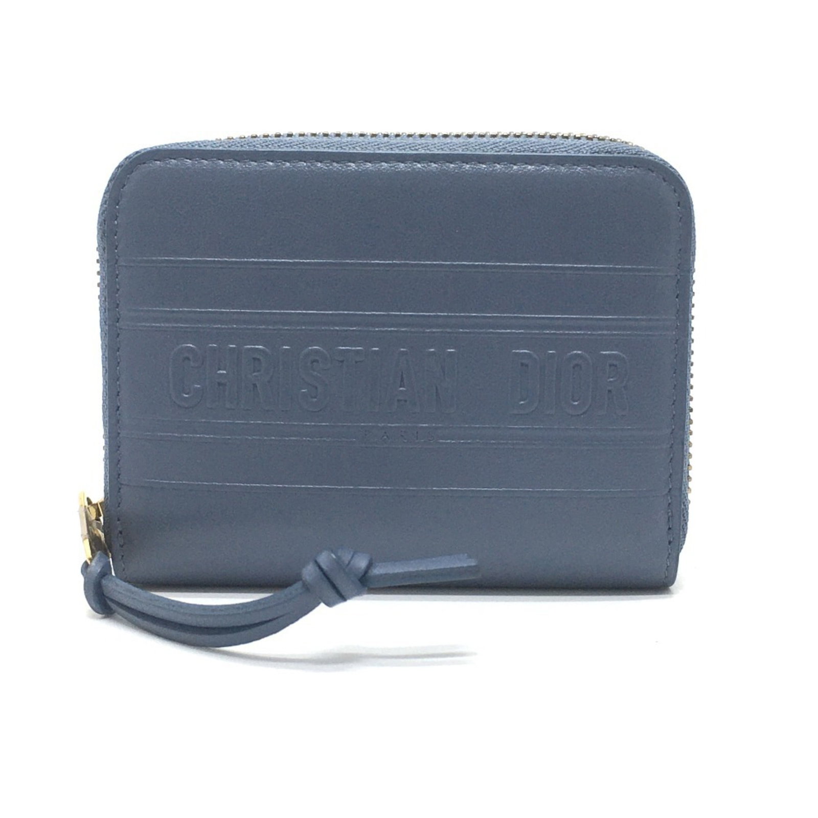 Dior Christian Coin Leather Purse: Dior Christian Coin Leather Purse The Dior Christian Coin Leather Purse is a stylish and compact wallet featuring a striking blue color and striped design. Made from high-quality leather, this coin pu