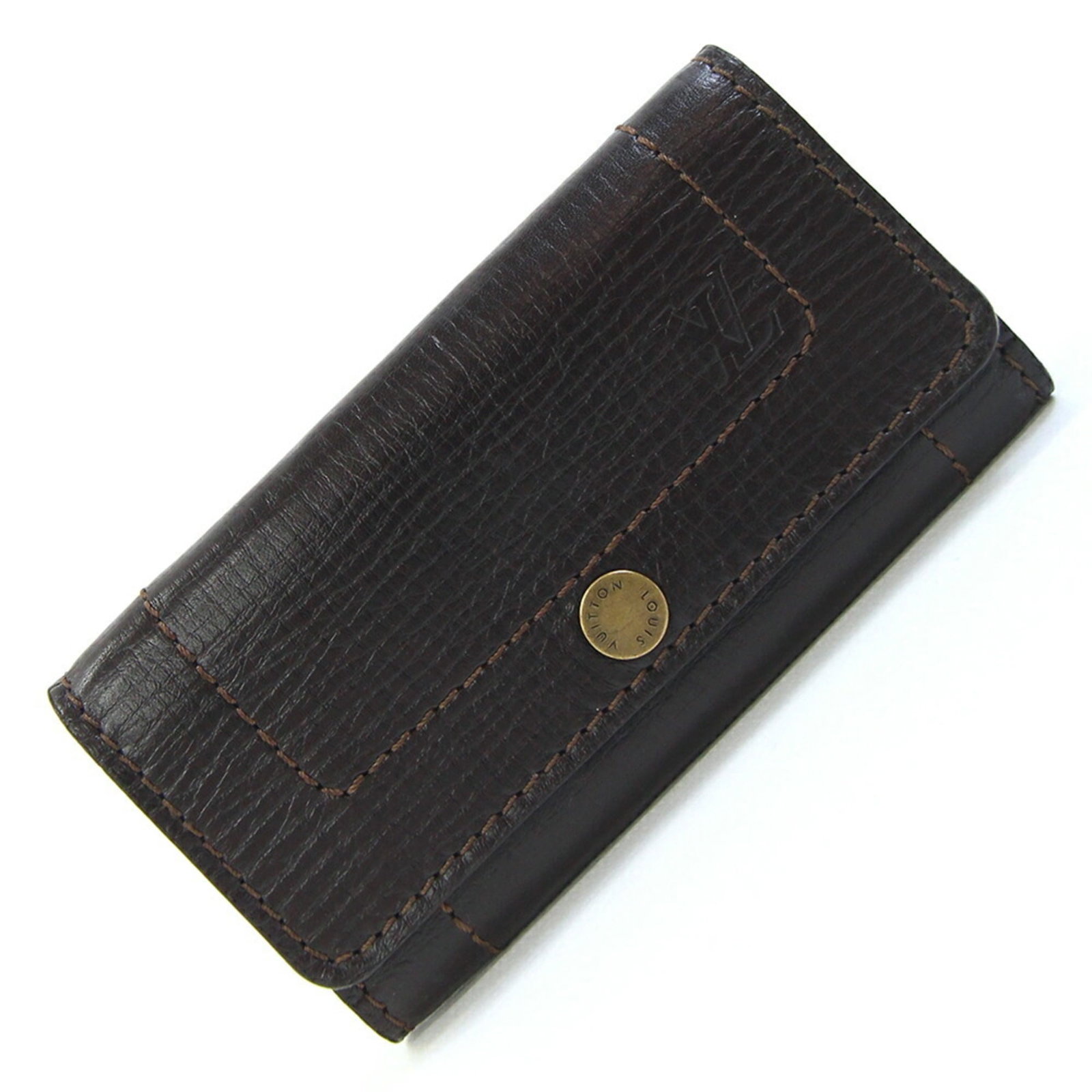 Louis Vuitton Keycase: Louis Vuitton Keycase The Louis Vuitton Keycase is a compact, coffee-colored accessory with 6 key hooks, measuring 6.5cm x 12cm. Its sleek design and durable construction make it a practical and styli