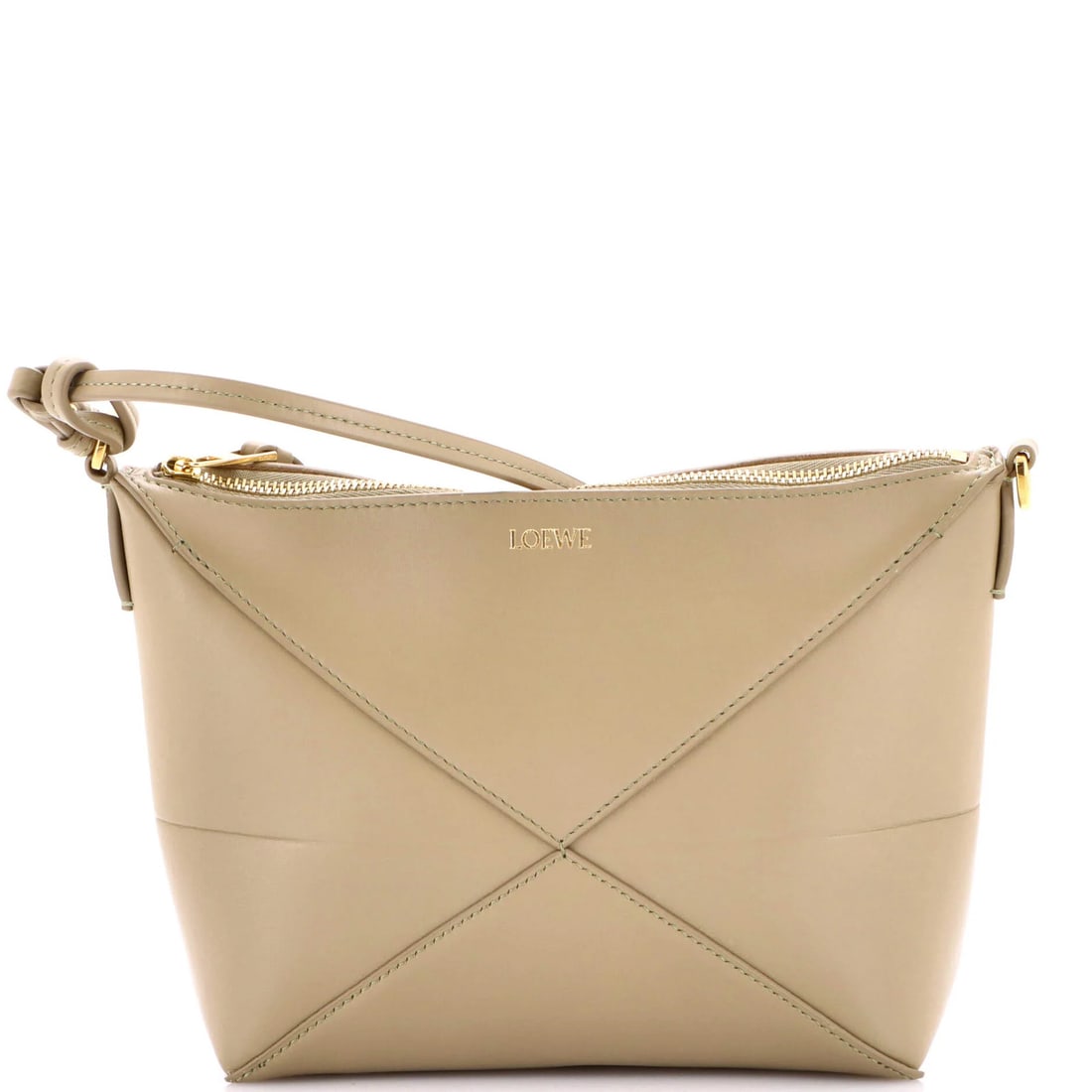 Puzzle Pouch Bag Leather: Puzzle Pouch Bag Leather The Puzzle Pouch Bag Leather is a unique, green leather clutch with suede interior and gold hardware, featuring a distinctive puzzle pouch design. Measuring 6" x 7" x 2.5", th