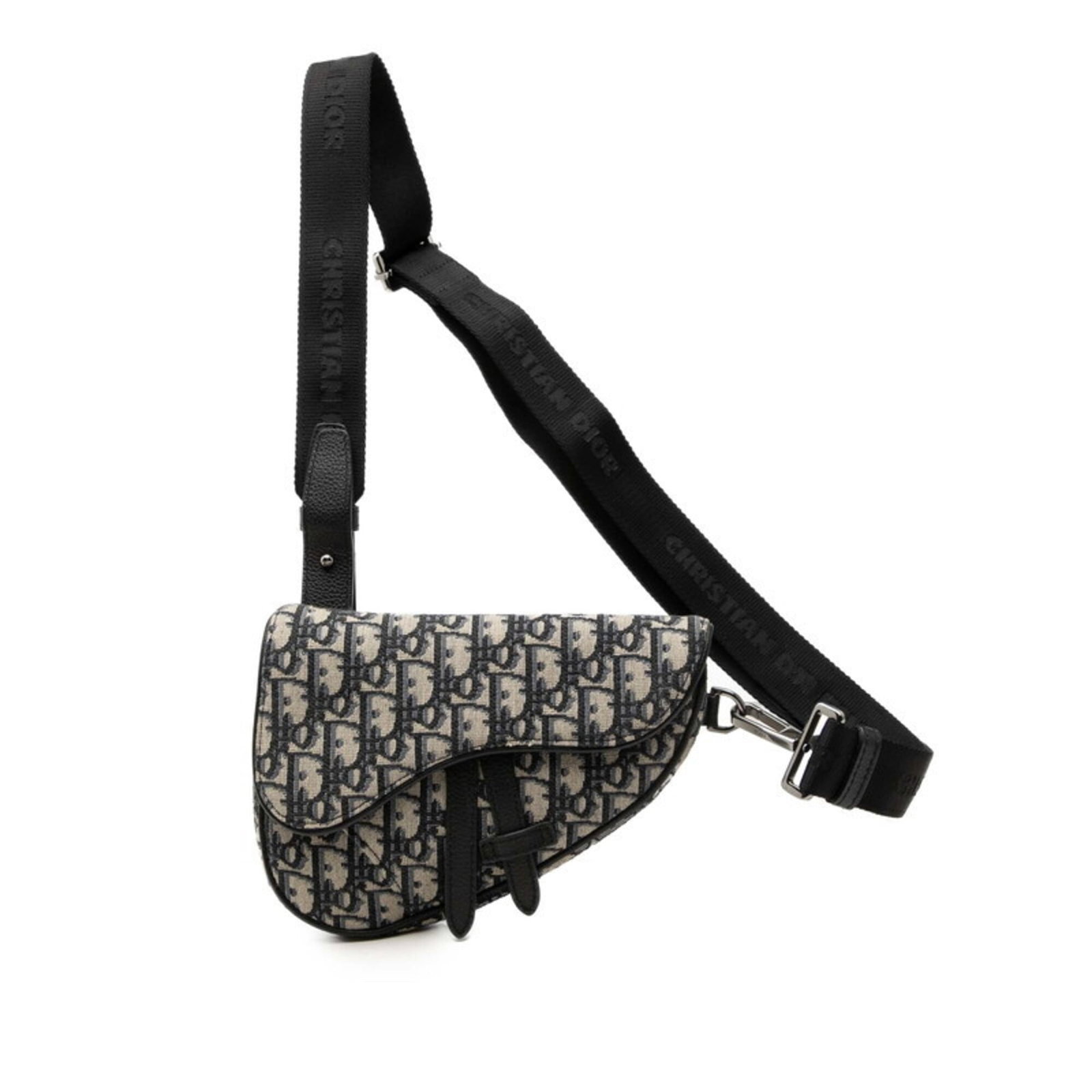 Canvas leather sling bag Dior Christian: Canvas leather sling bag Dior Christian Canvas leather sling bag Dior Christian bears a signature. Made from canvas and leather, this bag measures 15cm x 21cm x 2.5cm. The beige and navy black color