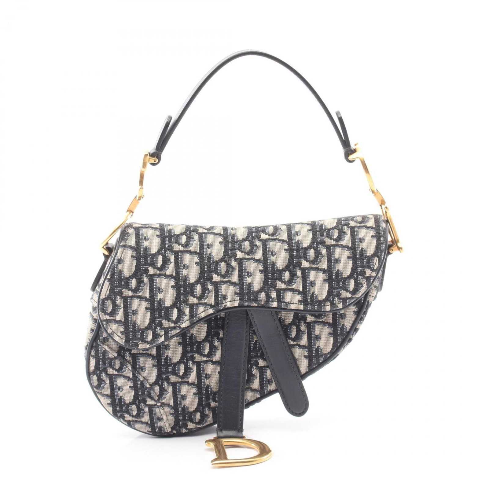 Christian Dior Leather Canvas Saddle Bag: Christian Dior Leather Canvas Saddle Bag Canvas and leather blend in this Christian Dior Saddle Bag, available in beige, black, and navy hues. The bag's dimensions are 13cm x 18cm x 5cm, making it a