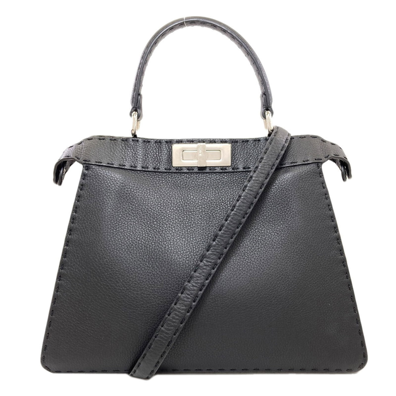 Handbag Leather Fendi: Handbag Leather Fendi Black Fendi leather handbag with dimensions 25.5cm x 33cm x 11cm. This handbag features high-quality leather material and a sleek design. The signature is present on the item. It