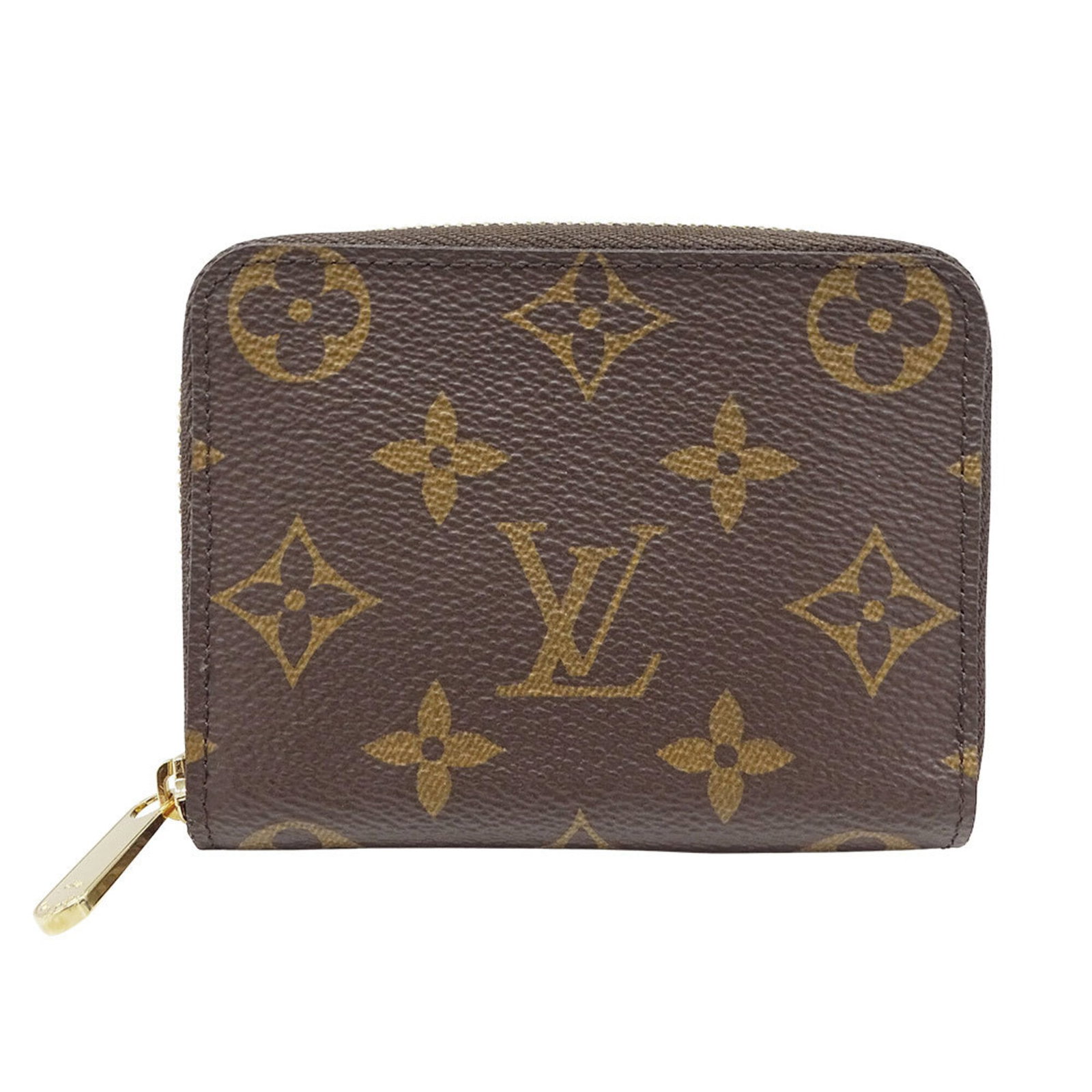 Coin purse Monogram Louis Vuitton: Coin purse Monogram Louis Vuitton Monogrammed with iconic Louis Vuitton design, this brown coin purse boasts a classic, timeless look. Made from high-quality materials, its sturdy 9cm x 11cm x 2cm dim