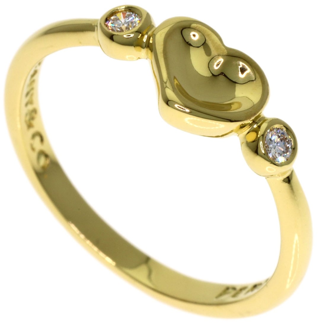 Tiffany&Co. Closed Heart 2P Diamond Ring K18 Yellow Gold: Tiffany&Co. Closed Heart 2P Diamond Ring K18 Yellow Gold Tiffany&Co.'s Closed Heart 2P Diamond Ring is a stunning piece of jewelry featuring a K18 yellow gold setting and a main stone of diamond. The 