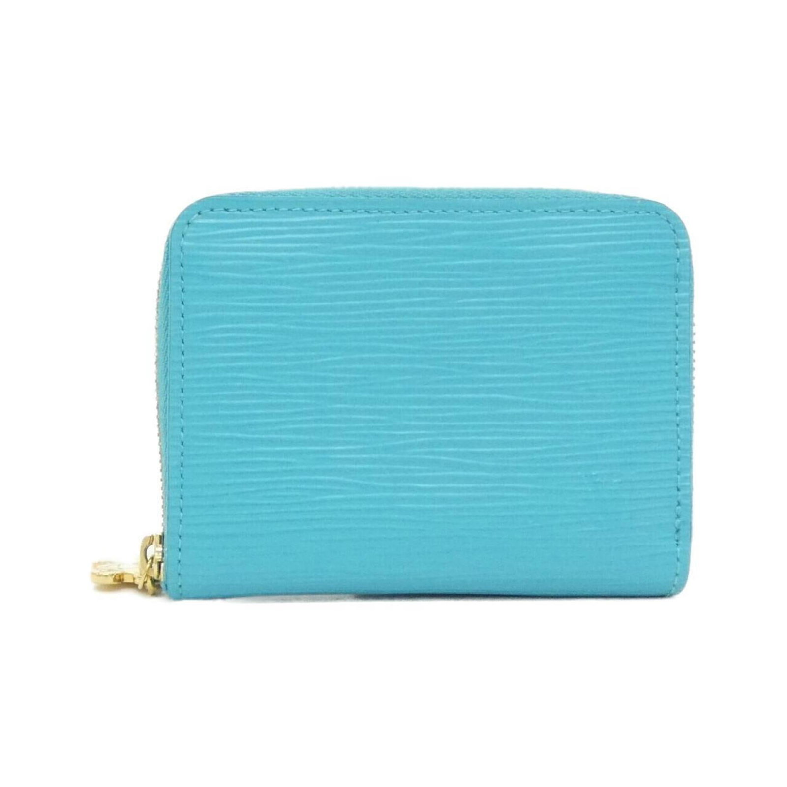 Louis Vuitton Purse Coin Case Leather: Louis Vuitton Purse Coin Case Leather Louis Vuitton's iconic coin case leather purse is a stylish accessory for everyday carry. Made from high-quality calfskin leather, this compact coin case measures
