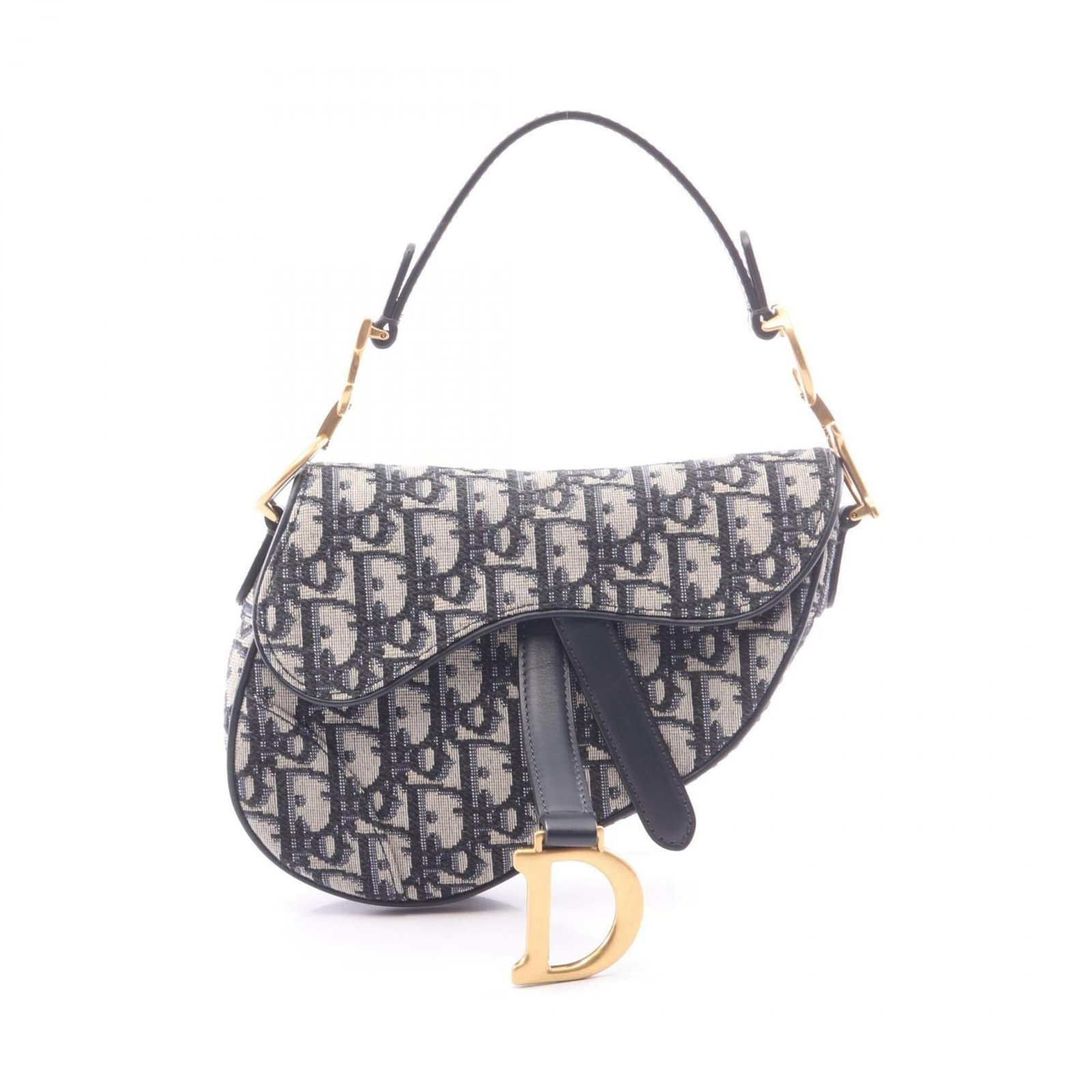 Christian Dior Leather Canvas Saddle Bag: Christian Dior Leather Canvas Saddle Bag Canvas and leather come together in this understated Christian Dior Saddle Bag, boasting a classic beige and navy color combination. Measuring 13cm x 18cm x