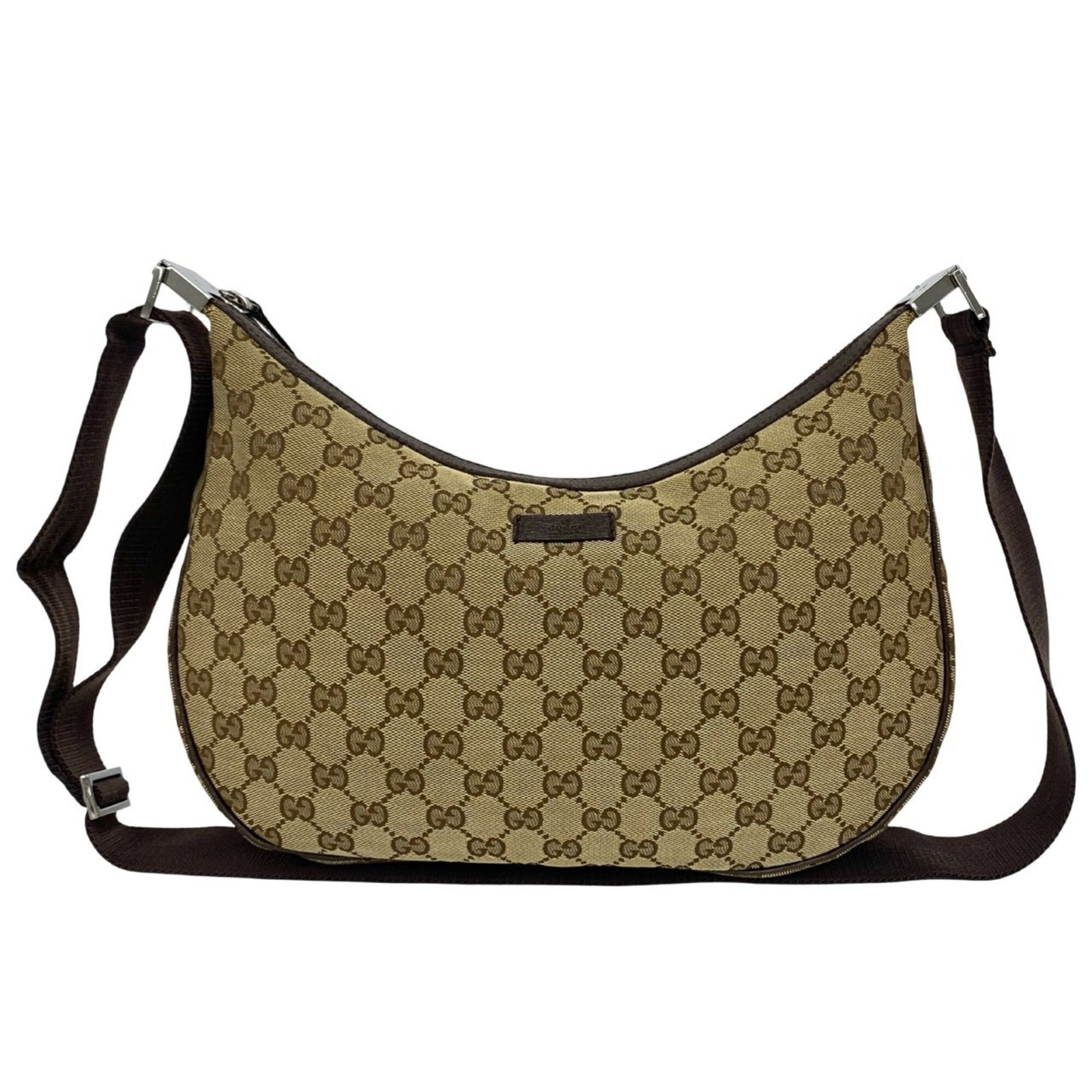 Canvas Leather Pochette Gucci Shoulder Bag: Canvas Leather Pochette Gucci Shoulder Bag Canvas and leather combine in this Gucci Pochette shoulder bag, featuring a classic design with a brown color and measurements of 20cm x 33cm x 5.5cm. The