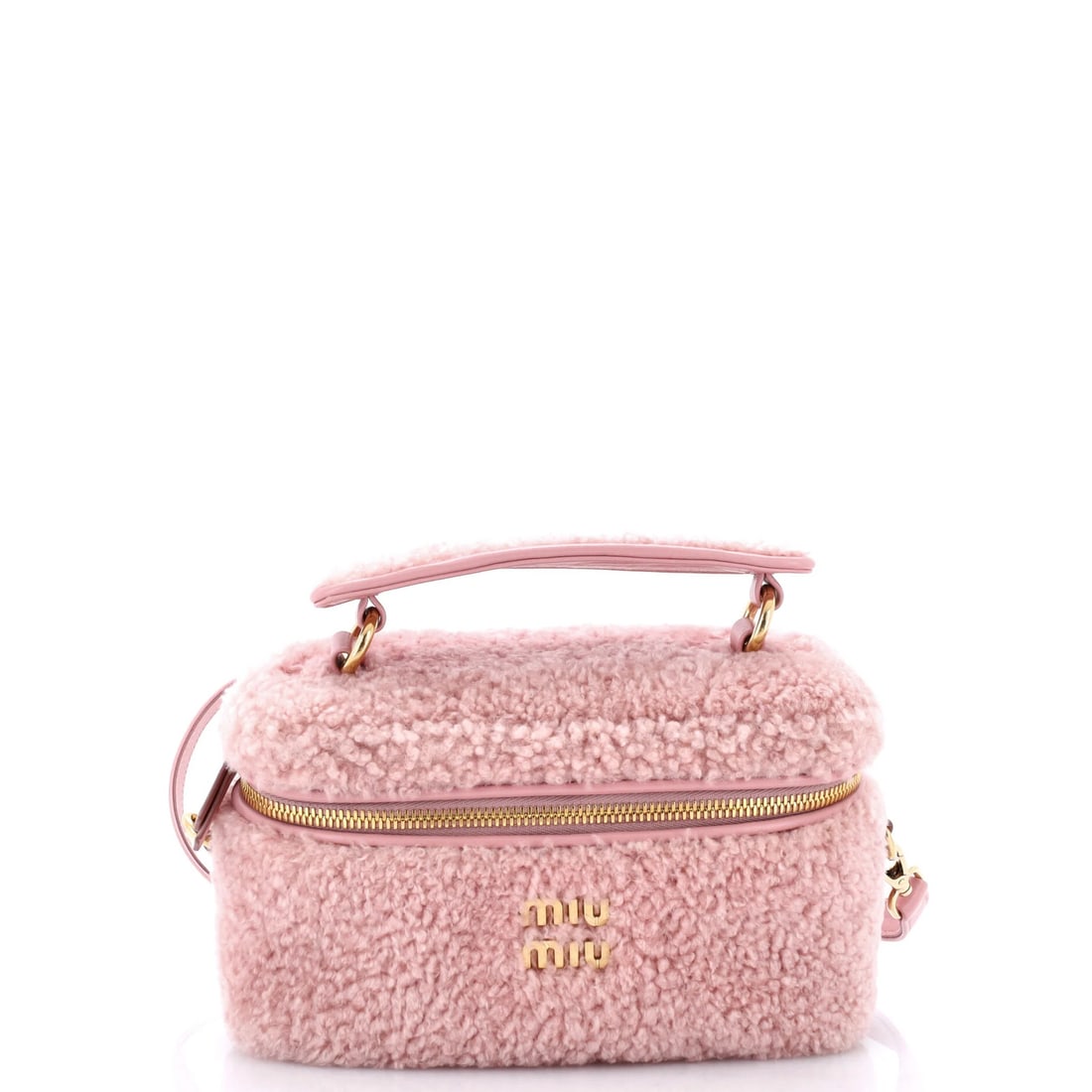 Miu Shearling Top Handle Case Vanity: Miu Shearling Top Handle Case Vanity Shearling exterior and satin interior make this top handle vanity case a stylish and luxurious accessory. The pink color and gold hardware add a touch of