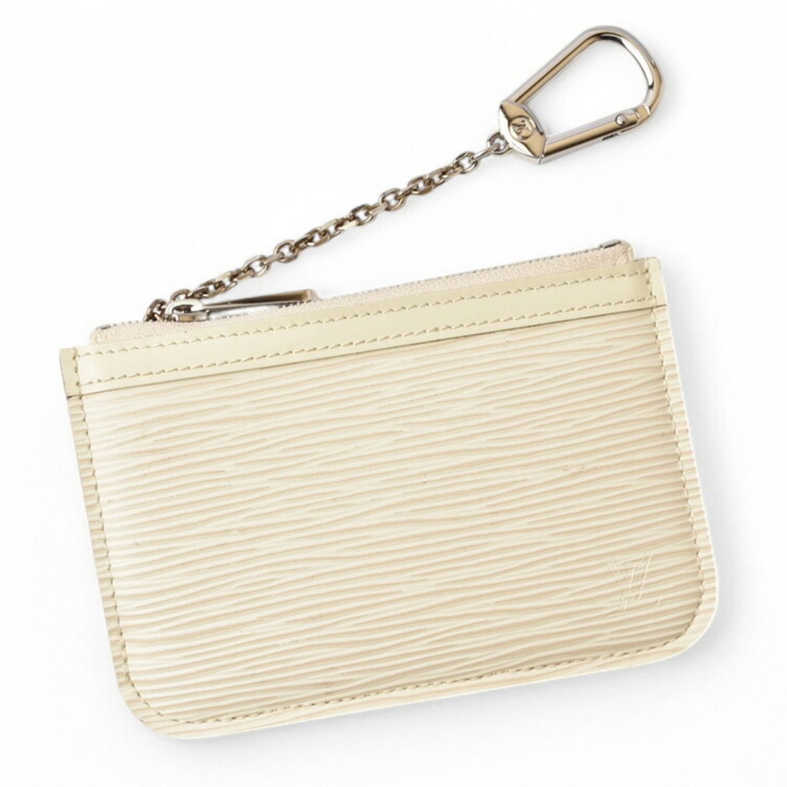 Louis Vuitton Purse Coin Case Leather: Louis Vuitton Purse Coin Case Leather The Louis Vuitton Purse Coin Case Leather is a sleek and compact accessory, measuring 9cm x 2cm with a soft Off-white leather finish. This stylish coin case