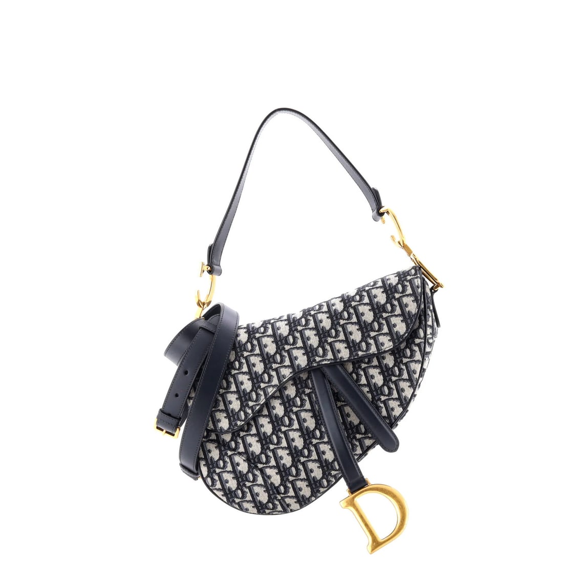 Saddle Handbag Strap Oblique Canvas Medium Christian Dior: Saddle Handbag Strap Oblique Canvas Medium Christian Dior Saddle Handbag with Strap Oblique Canvas Medium from Christian Dior features a striking blue canvas exterior with oblique design, showcasing