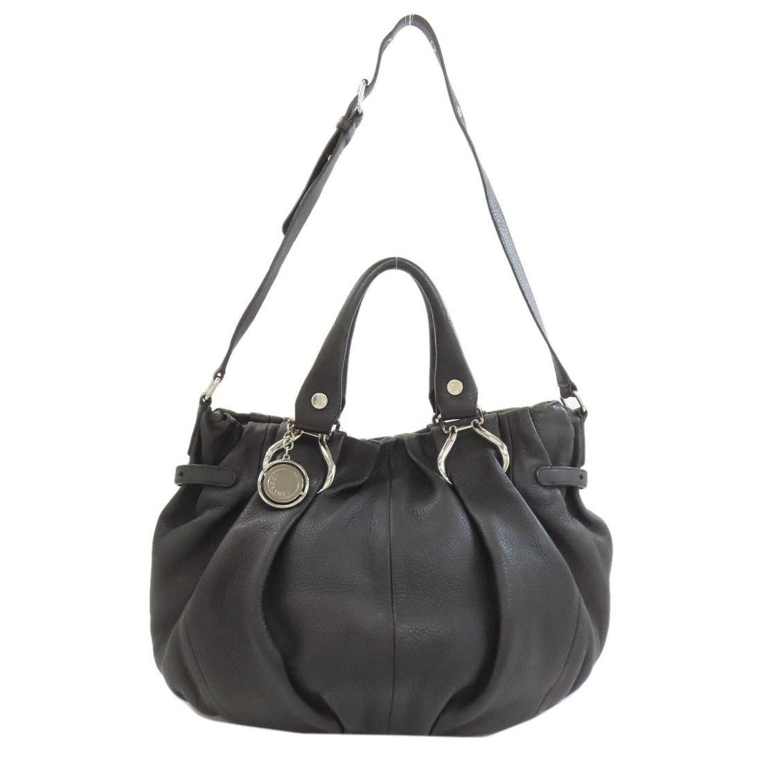 Celine 2-Way Pillow Handbag Leather: Celine 2-Way Pillow Handbag Leather Black leather handbag with a 2-way design, bearing a signature. This Celine handbag features a sleek black exterior made from high-quality leather. Item Specifics: