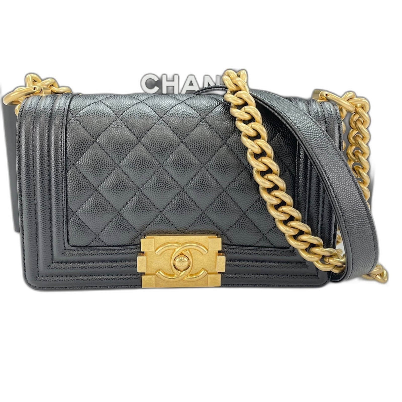 Shoulder Bag by Chanel: Shoulder Bag by Chanel Black Boy Chanel shoulder bag with a sleek design and compact size. Measuring 12cm x 20cm x 7cm, this bag is perfect for everyday carry. Its classic style and understated elegan