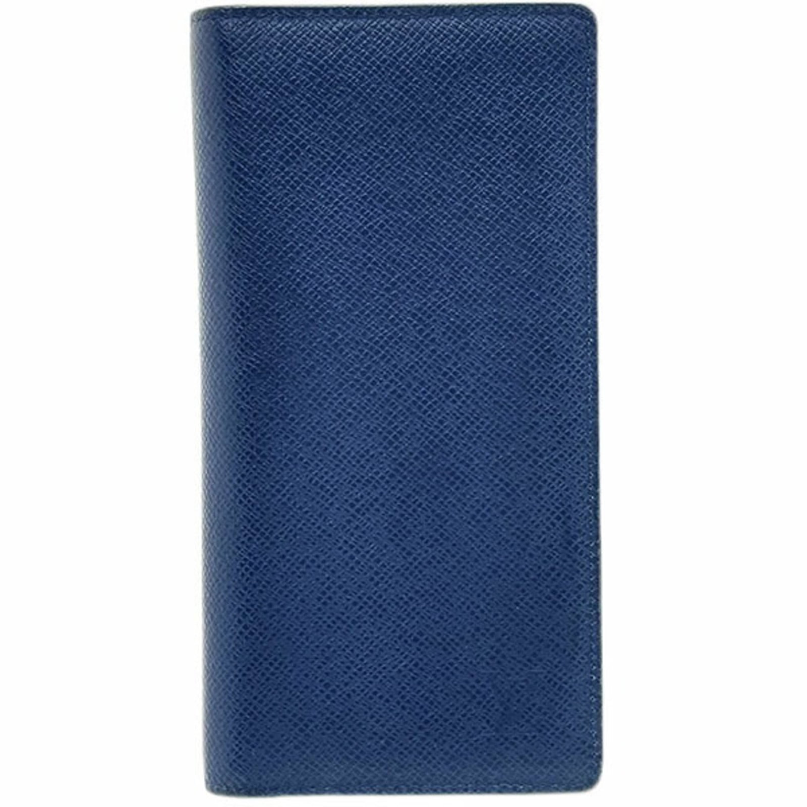 Vuitton Long Wallet Bi Fold Taiga Leather: Vuitton Long Wallet Bi Fold Taiga Leather Taiga leather embossed with a classic design, this Louis Vuitton Long Wallet Bi Fold features a timeless navy color and precise measurements. Made with