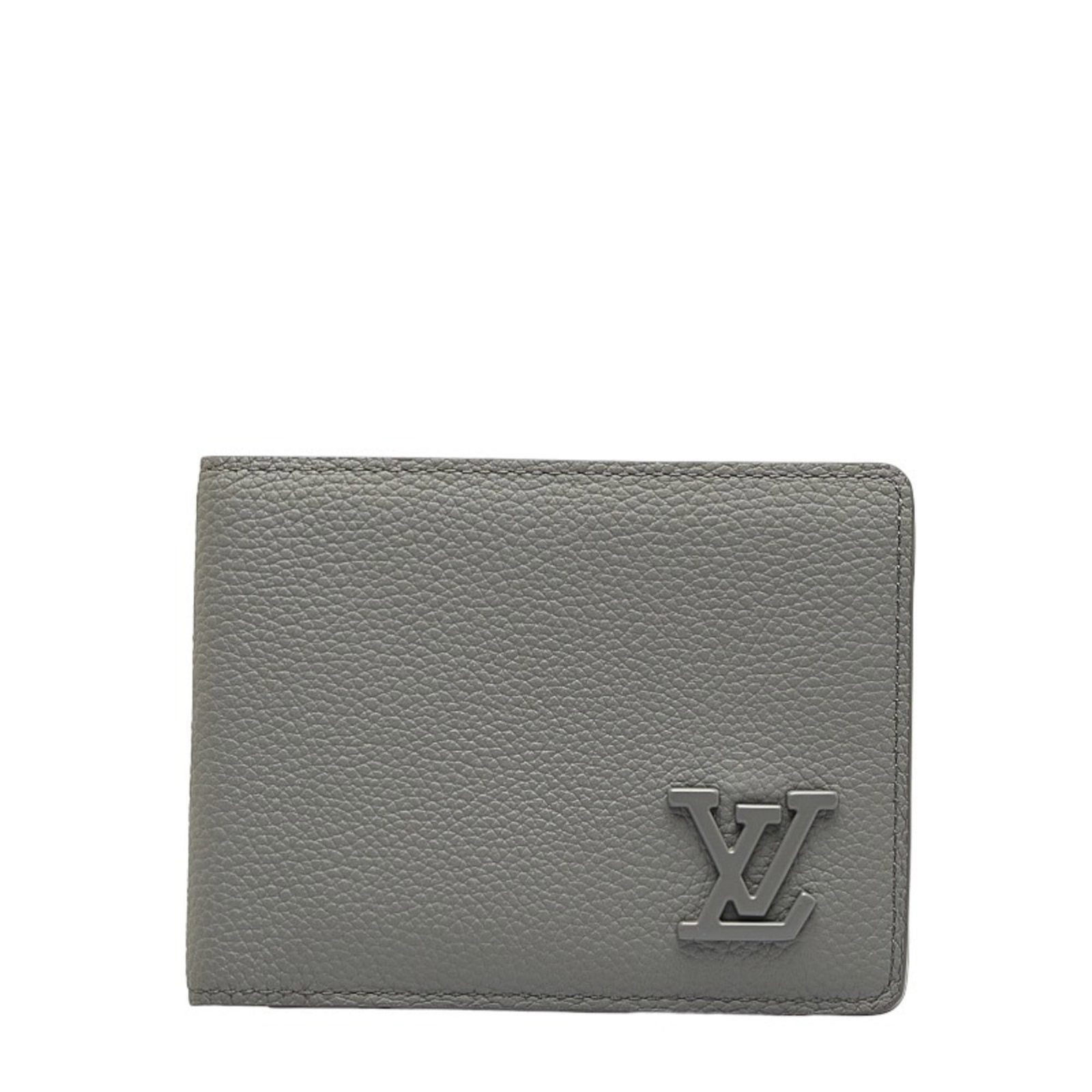 Louis Vuitton Wallet (Bi-Fold): Louis Vuitton Wallet (Bi-Fold) Gray Louis Vuitton bi-fold wallet with a flap closure, measuring 9.1cm x 12cm x 8.00mm. This wallet features a classic design and a durable construction. The signature o