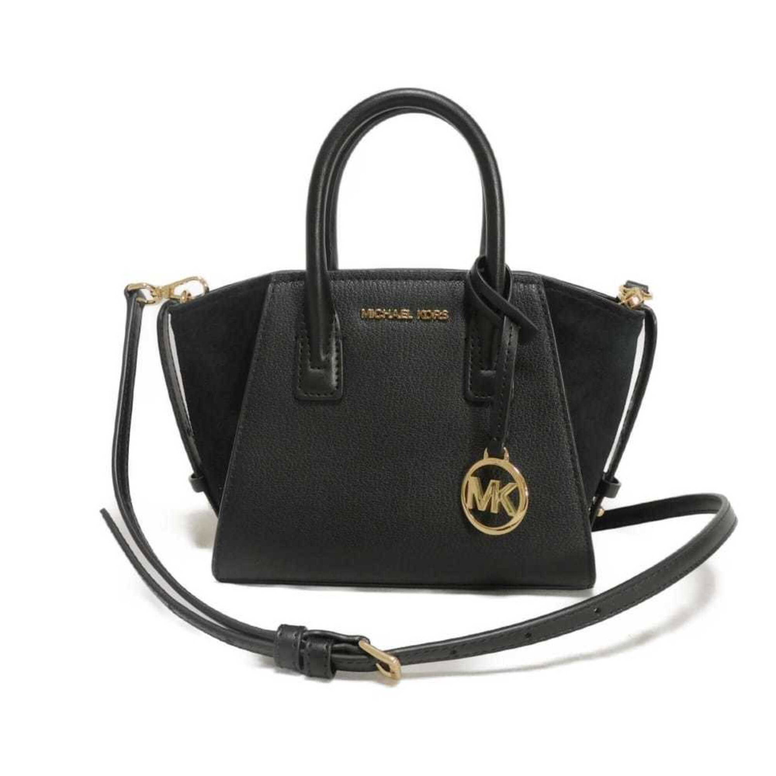 Suede Handbag Michael Kors: Suede Handbag Michael Kors Suede Michael Kors handbag in black, measuring 15.5cm x 8.5cm, with a sleek design that combines style and sophistication. This luxurious handbag features high-quality