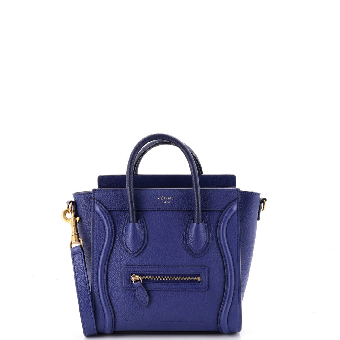 Luggage Bag Grainy Leather Nano Celine: Luggage Bag Grainy Leather Nano Celine Nano Celine Grainy Leather Cross Body Bag in Blue features a sleek design with a grainy leather exterior and suede interior. The bag measures 8" tall, 7.5" wide,