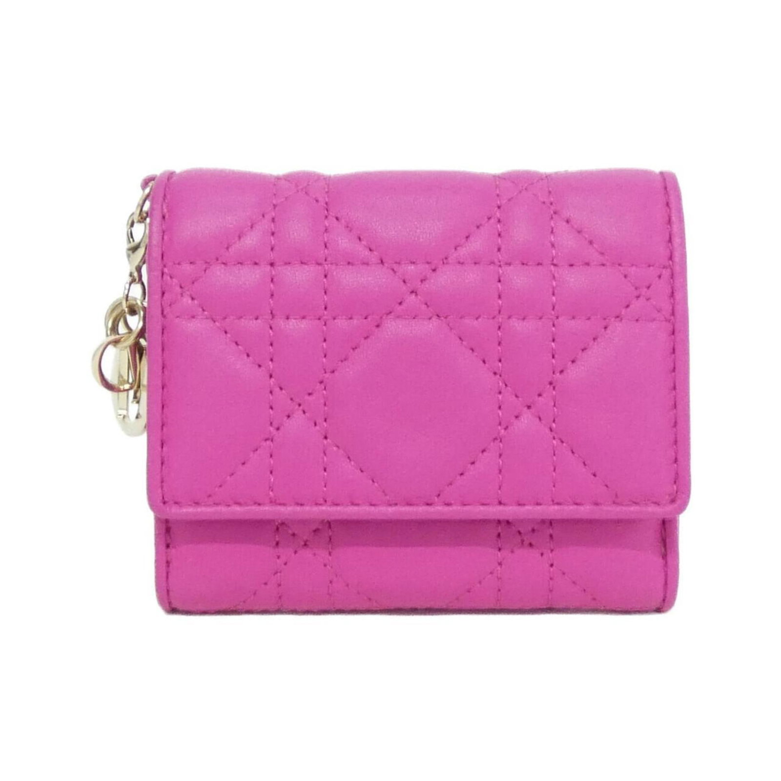Christian Dior Wallet (Tri-Fold) Leather: Christian Dior Wallet (Tri-Fold) Leather Christian Dior's tri-fold leather wallet is a stylish accessory, featuring a sleek pink design and durable leather construction. The wallet comes with a dust
