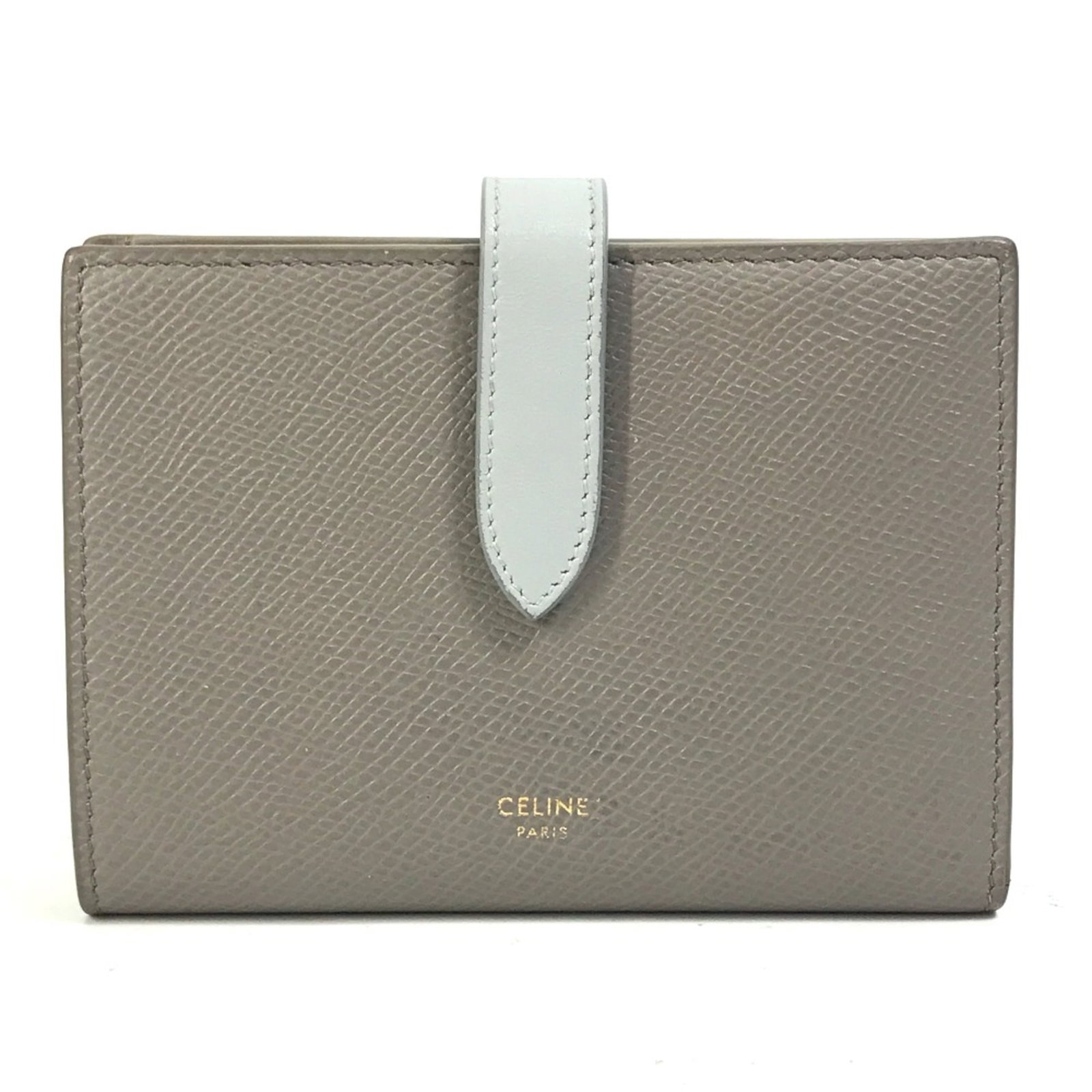 Celine Leather Wallet Fold: Celine Leather Wallet Fold The Celine Leather Wallet Fold boasts sleek, gray leather construction with a tri-fold design, measuring 14cm x 10cm x 2cm. This stylish wallet features a compact size and