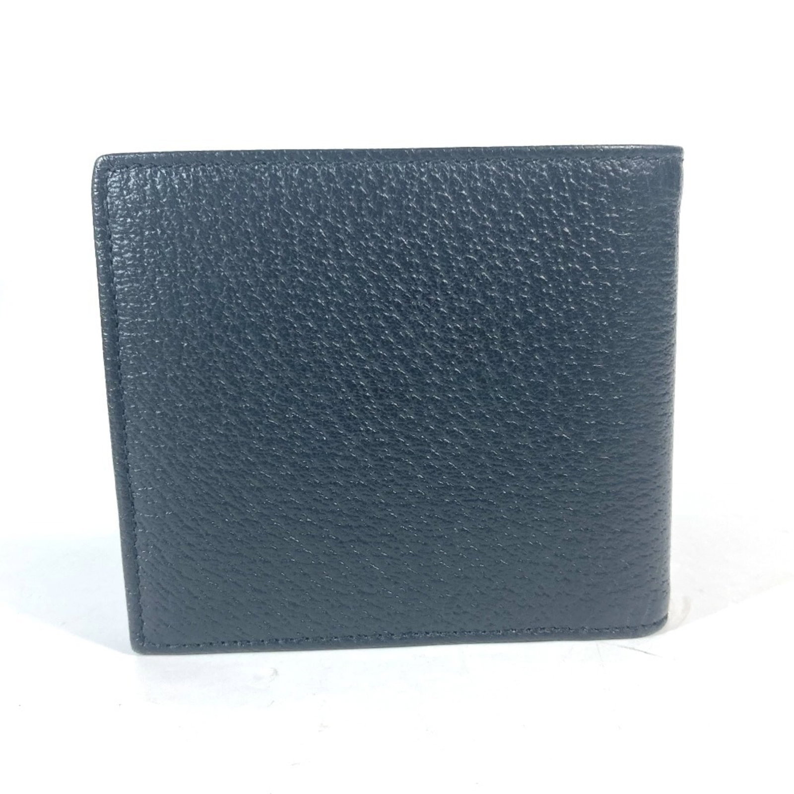 Gucci Wallet (Bi-Fold) Leather: Gucci Wallet (Bi-Fold) Leather The Gucci Wallet (Bi-Fold) Leather is a sleek and sophisticated accessory, featuring a classic bi-fold design made from high-quality leather. This black wallet comes